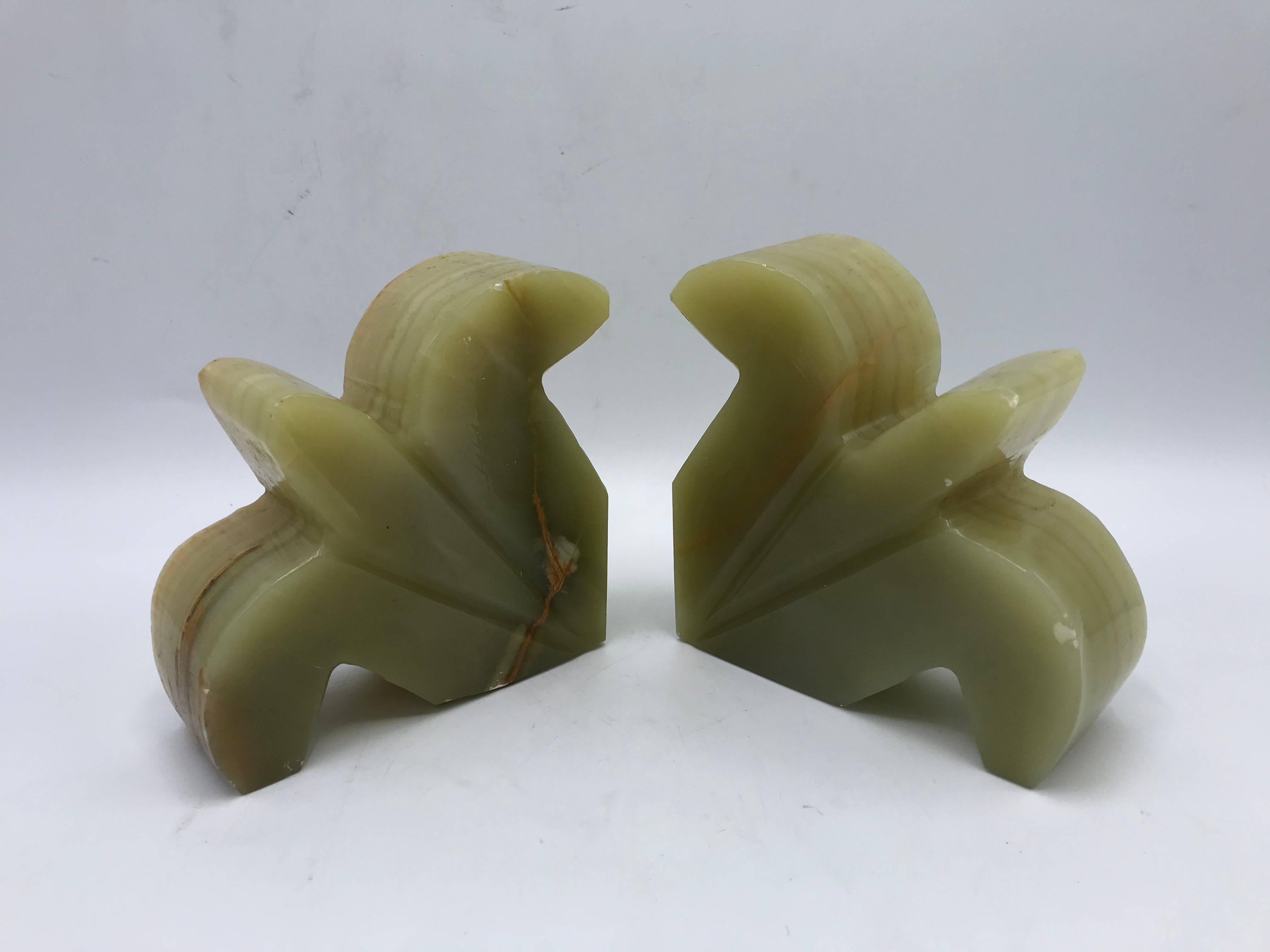 Offered is a stunning, pair of 1940’s fleur-de-lis, green solid-onyx bookends. Heavy.