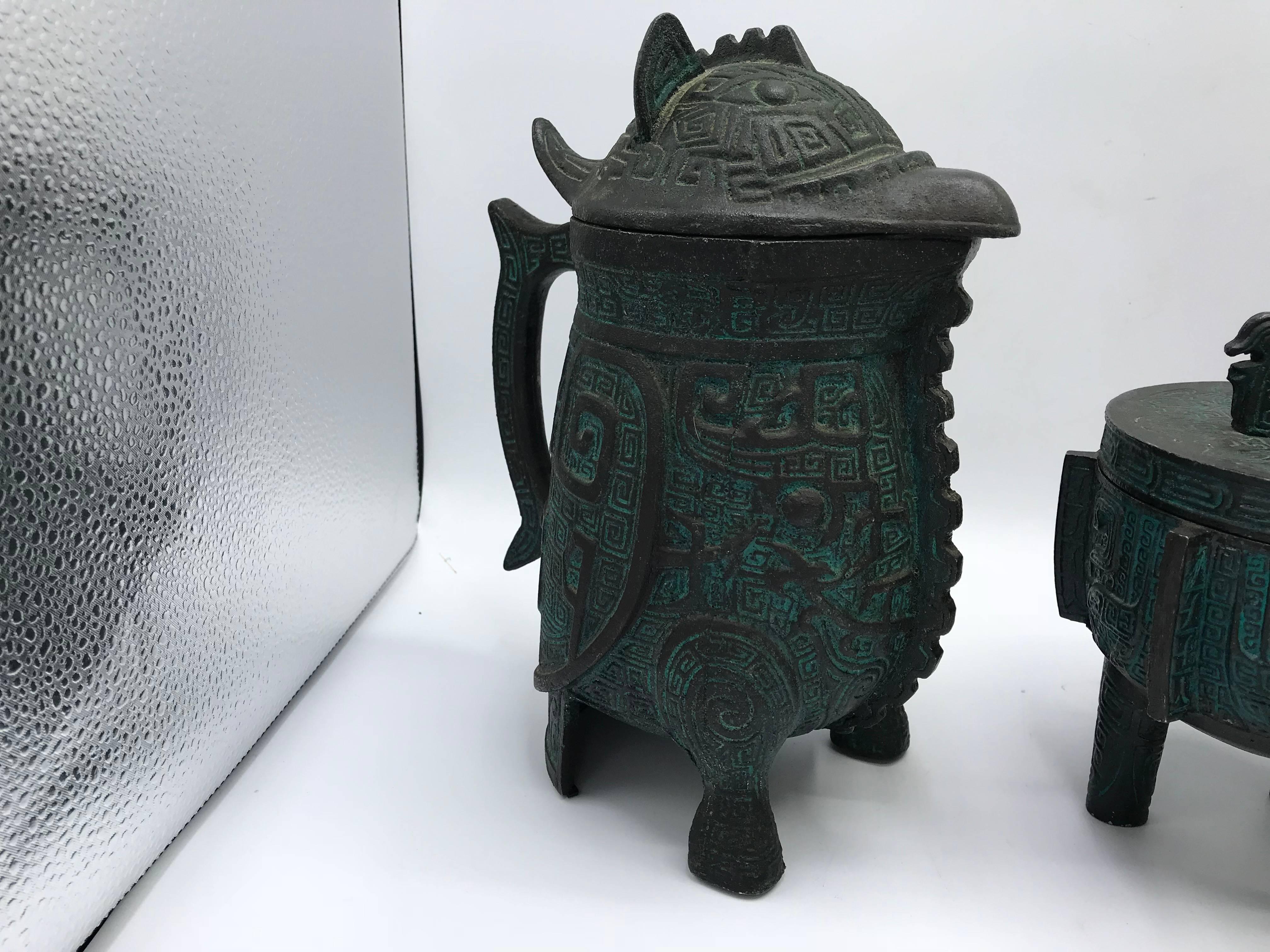 Listed is a fabulous, set of 1970s James Mont style bar pieces. The set includes: carafe pitcher, large ice bucket, and ashtray. All pieces include their original liners. All in excellent condition for their age. Ice bucket has a small chip along