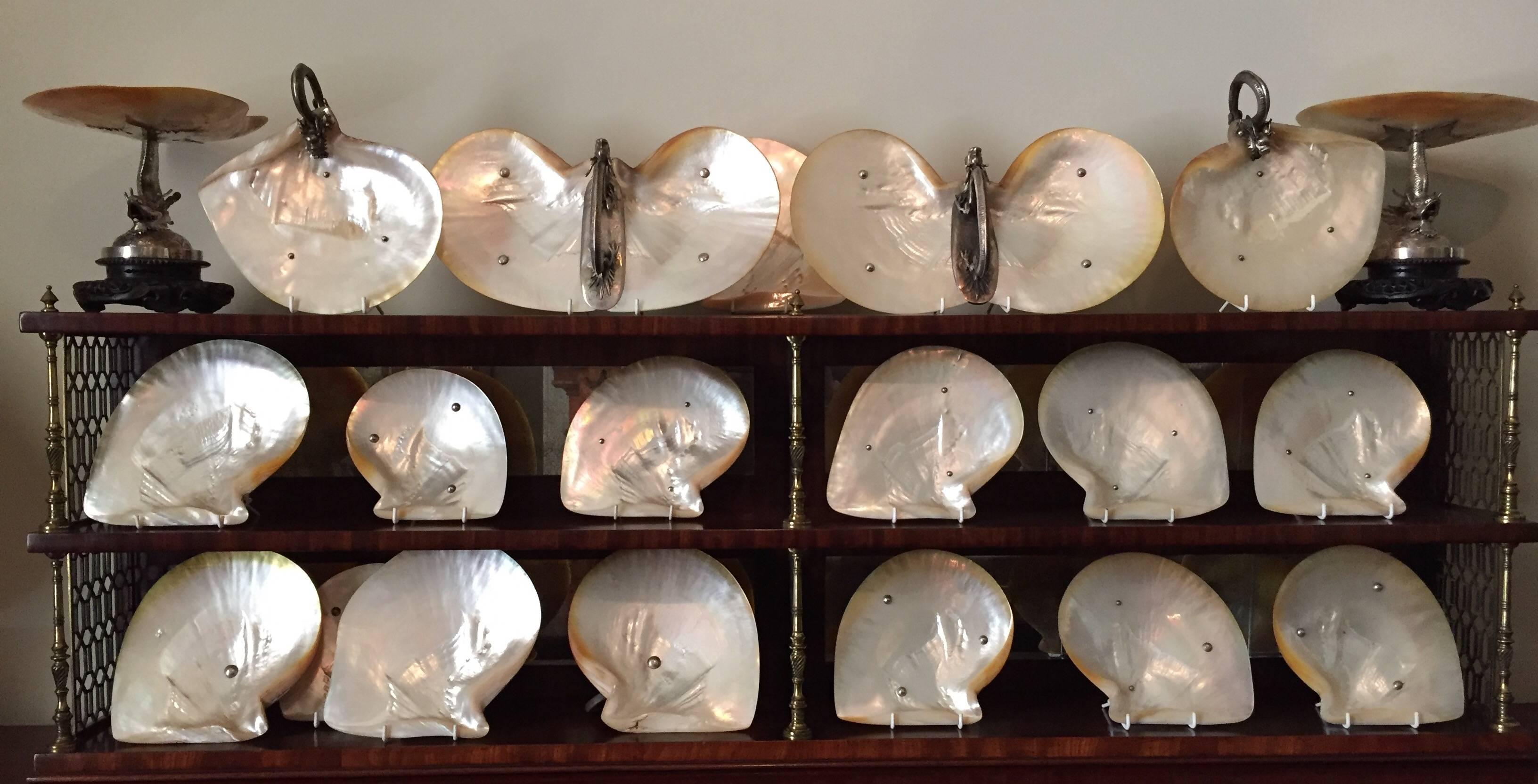 A seemingly unique 18 piece Queensland mother-of-pearl shell dessert service, silver mounted by Wang Hing, Hong Kong, circa 1900 with a dated contemporary correspondence, 6th October 1910 (see attached). 

In the 19th century the Queensland