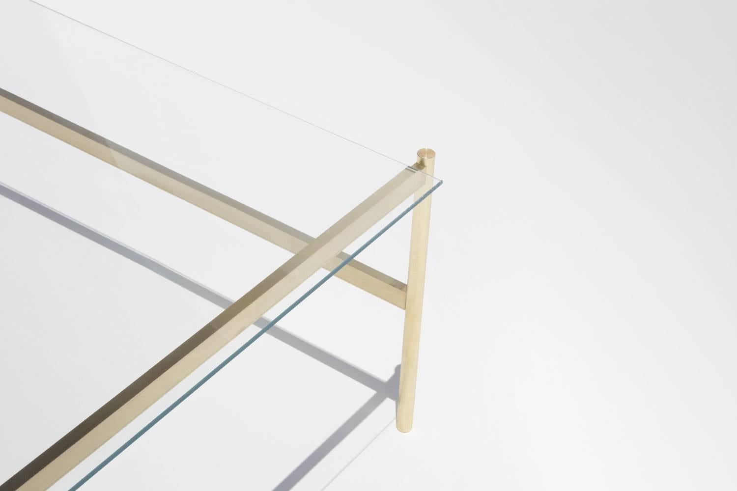 Made to order. Please allow 6 weeks for production.

Brass Frame / Clear Glass

The Duotone Furniture series is based on a modular hardware system that pairs sturdy construction with visual lightness and a range of potential configurations. Each