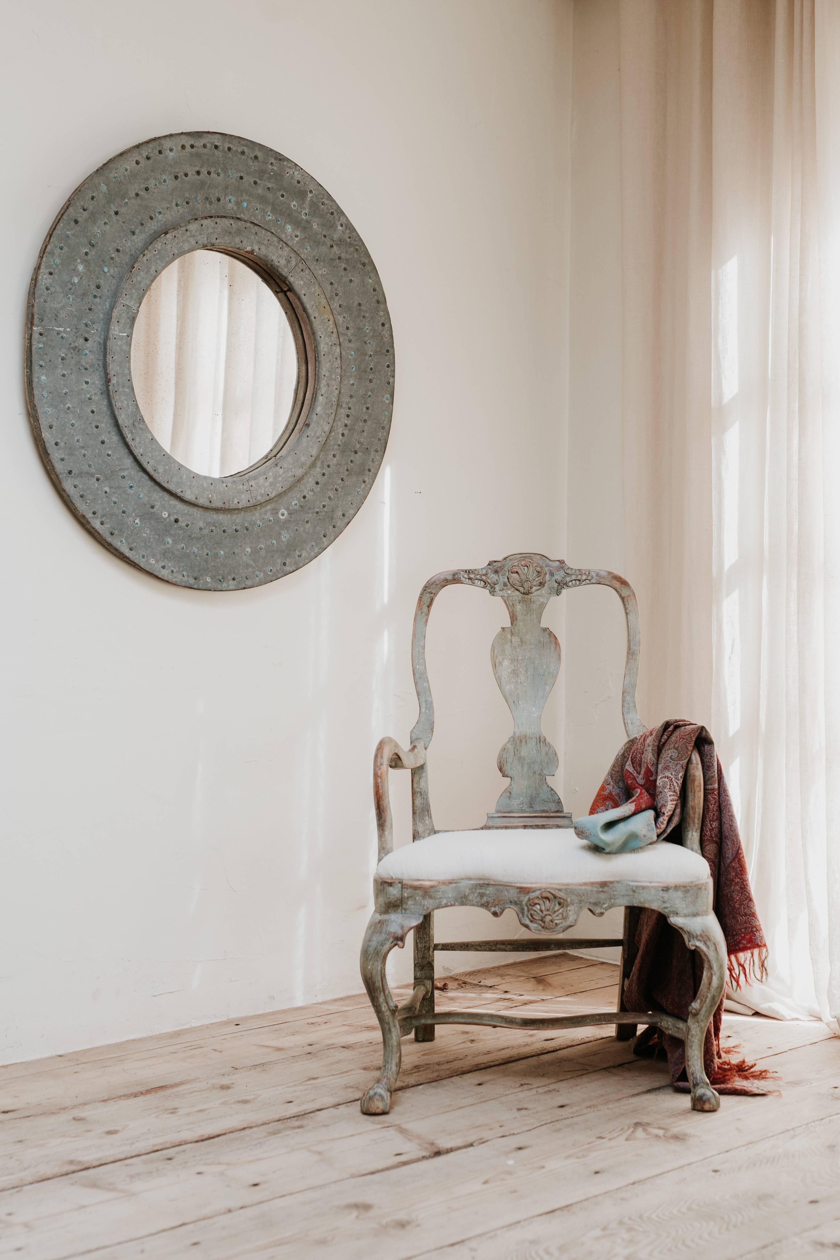 Sweden at its best, this 18th century Rococo armchair with old blue paint.