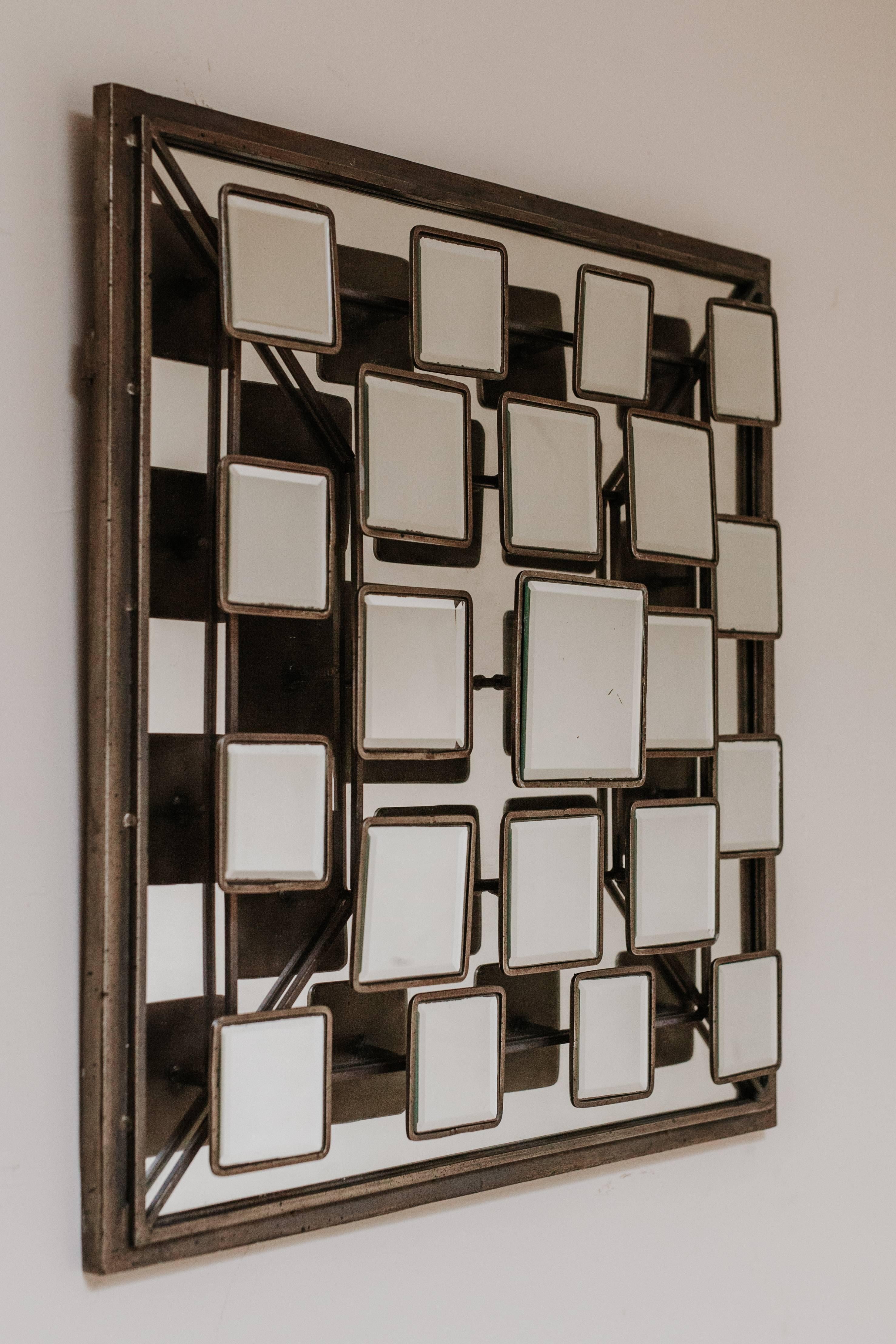 A quirky and funky 1970s out of the ordinary metal mirror.