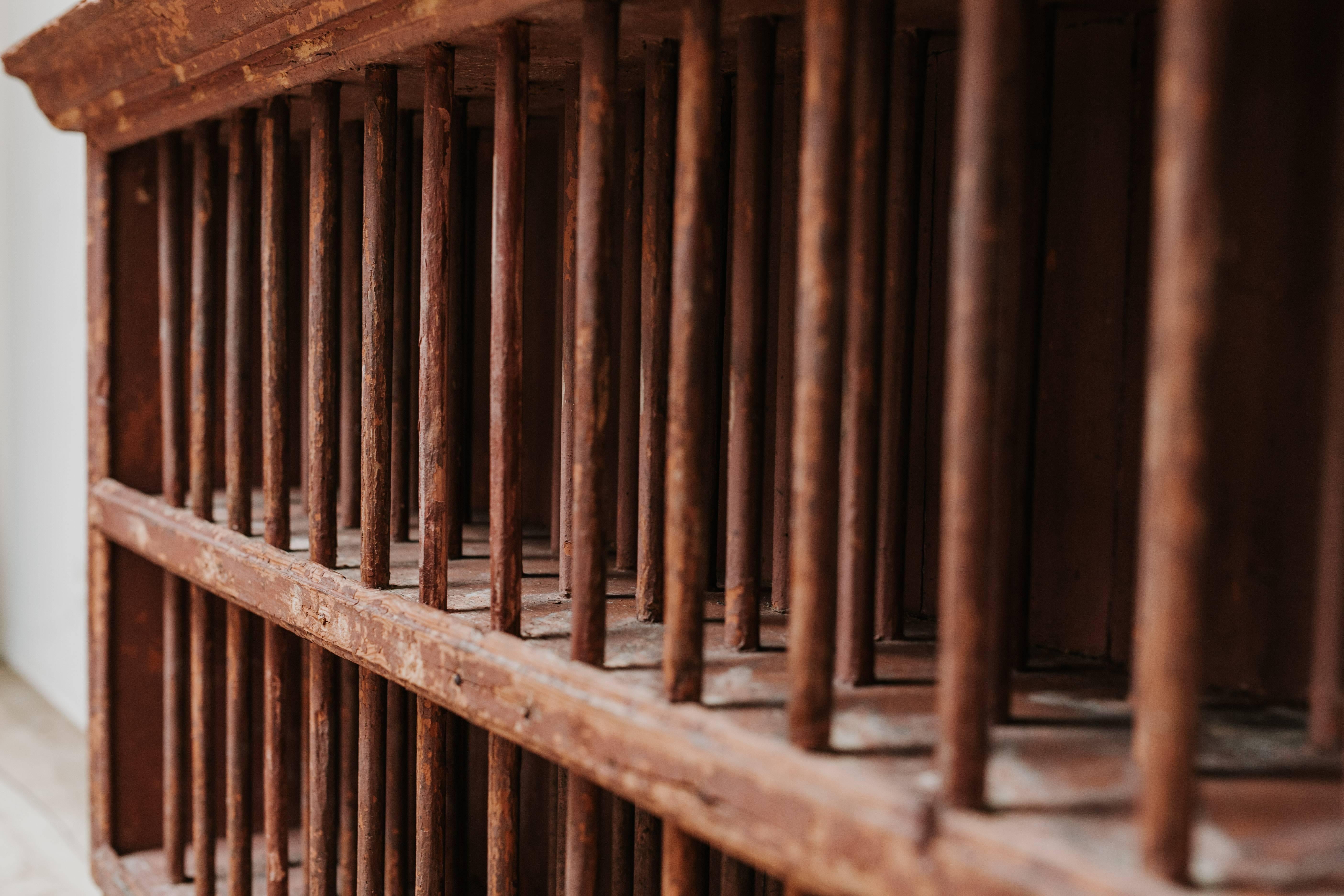 This is a Spanish 19th century plate rack, with rests of old paint.