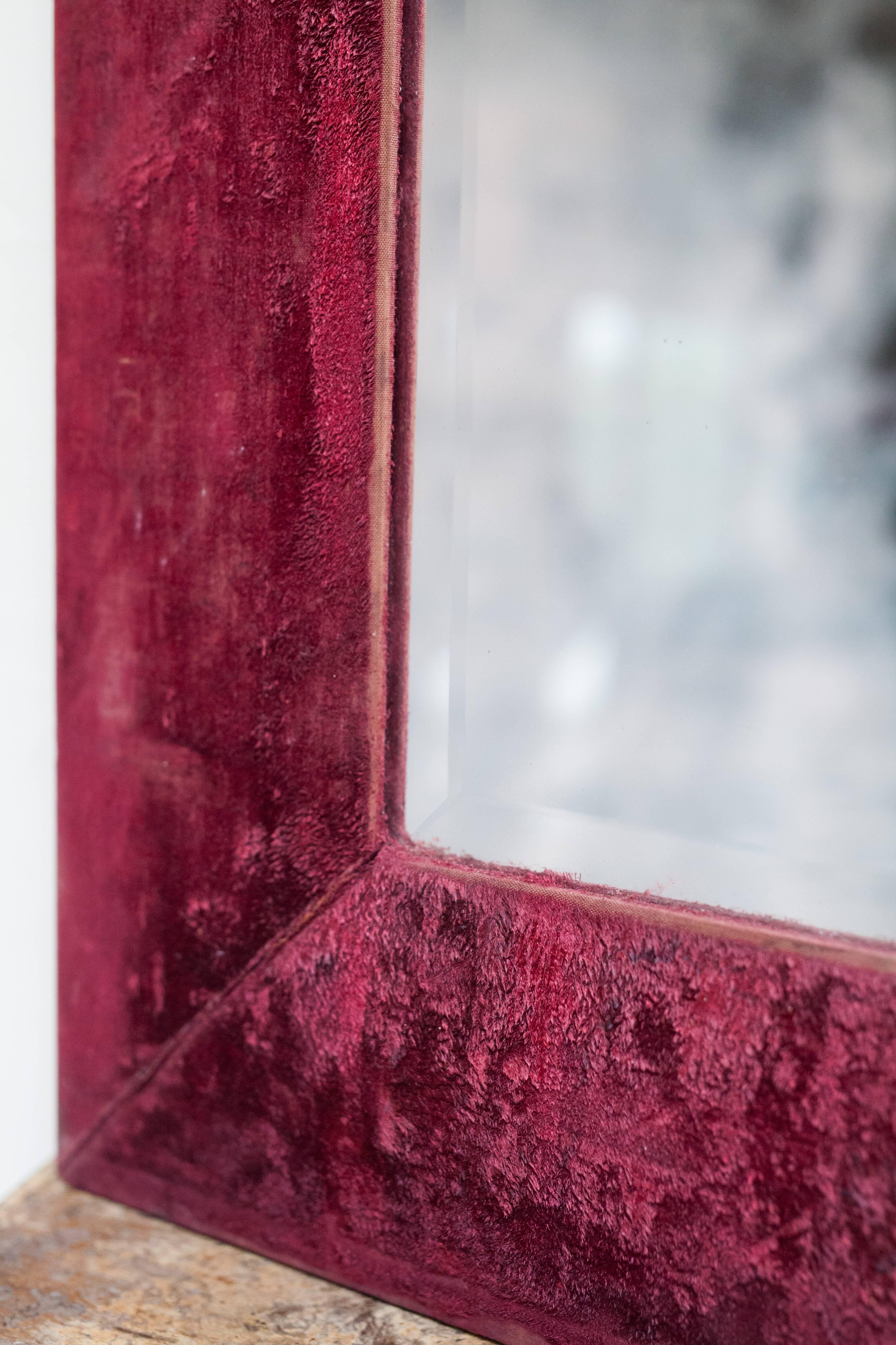red framed mirror