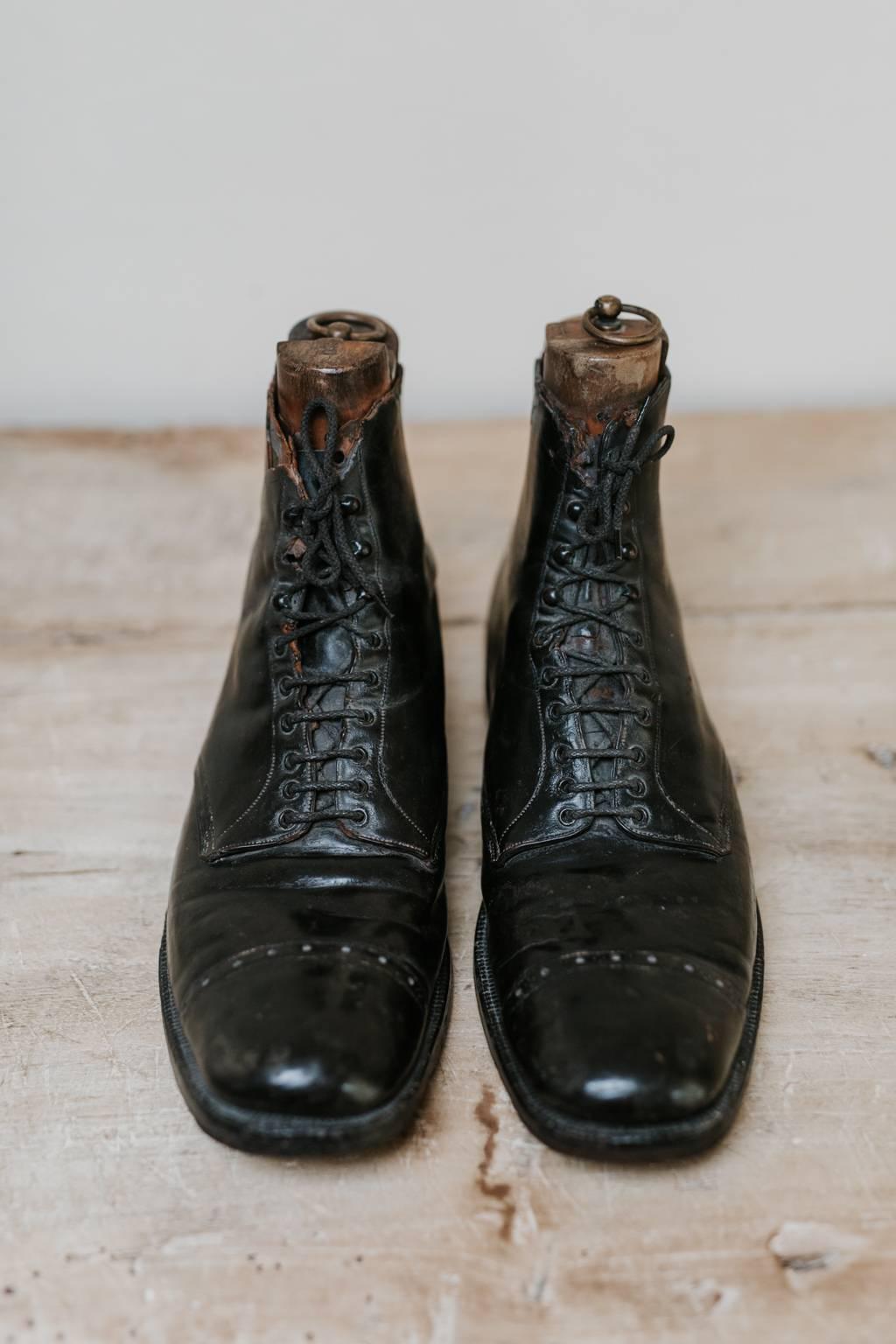 Pair of black leather giant shoes, great object for an eccentric, out of the ordinary, quirky collection ... the pair of shoes are from obviously a giant of a man with giant sized feet measuring size 19 UK or 20 USA size. Both leather shoes have