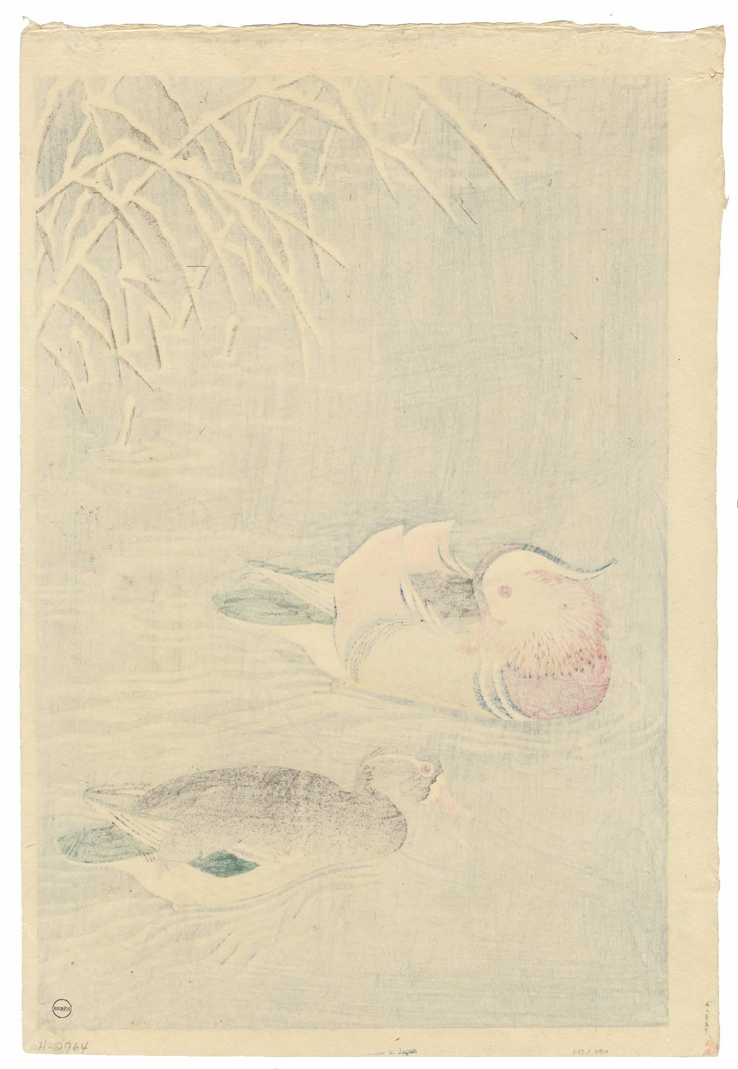 Title: Mandarin Ducks in The Snow
Artist: Koson Ohara, sealed as Shoson Ohara.
Published in 1935.
Hand-printed on Japanese washi paper.

This print shows a pair of mandarin ducks, floating on the water. Reed, heavy with snow is dipping into the