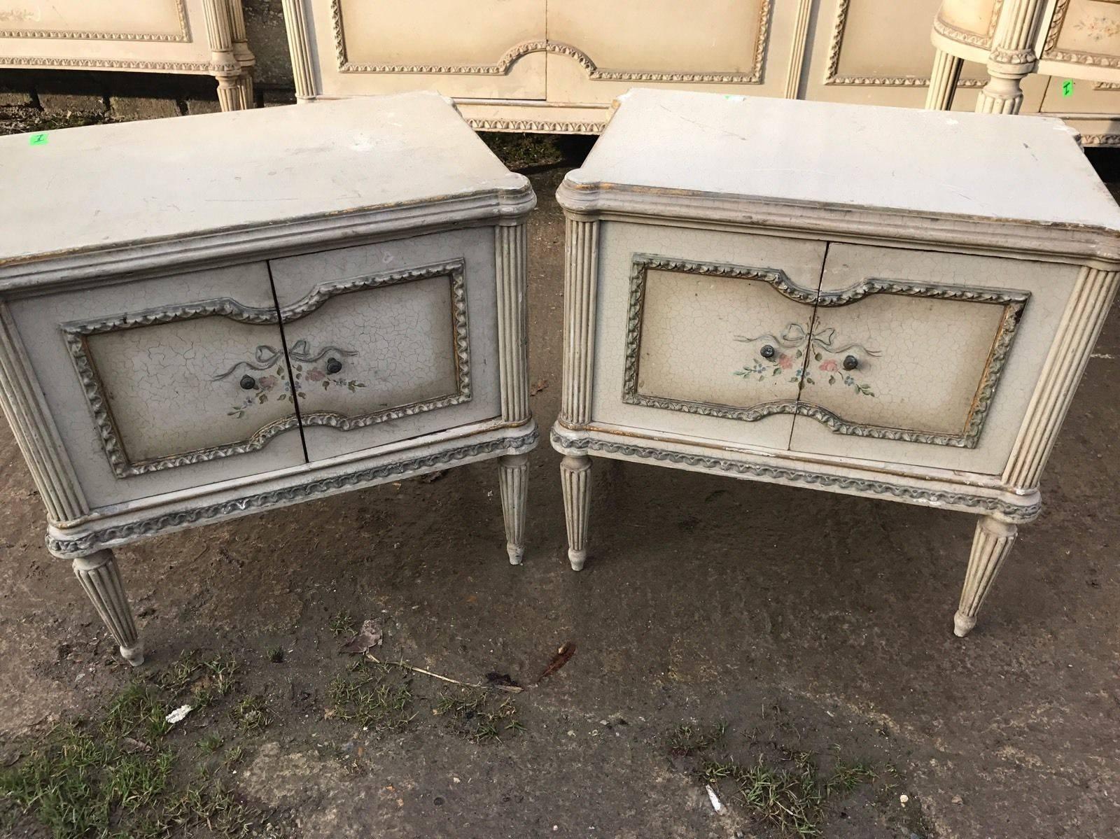 A very shabby pair of French bedside tables. Distressed and original, they consist of a cupboard. Structurally sound but chipped and distressed, please view pictures!