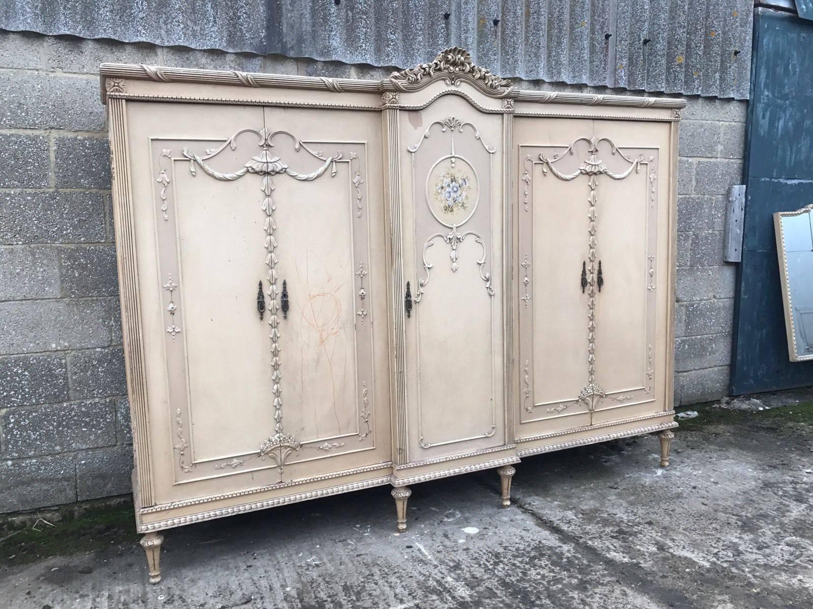 This is a very rare five-door French armoire. Very hard to come by, rarely seen for sale anywhere in the world!

With its original paint and original floral paint work, it really is a one off.

Splits down in to several sections for ease of