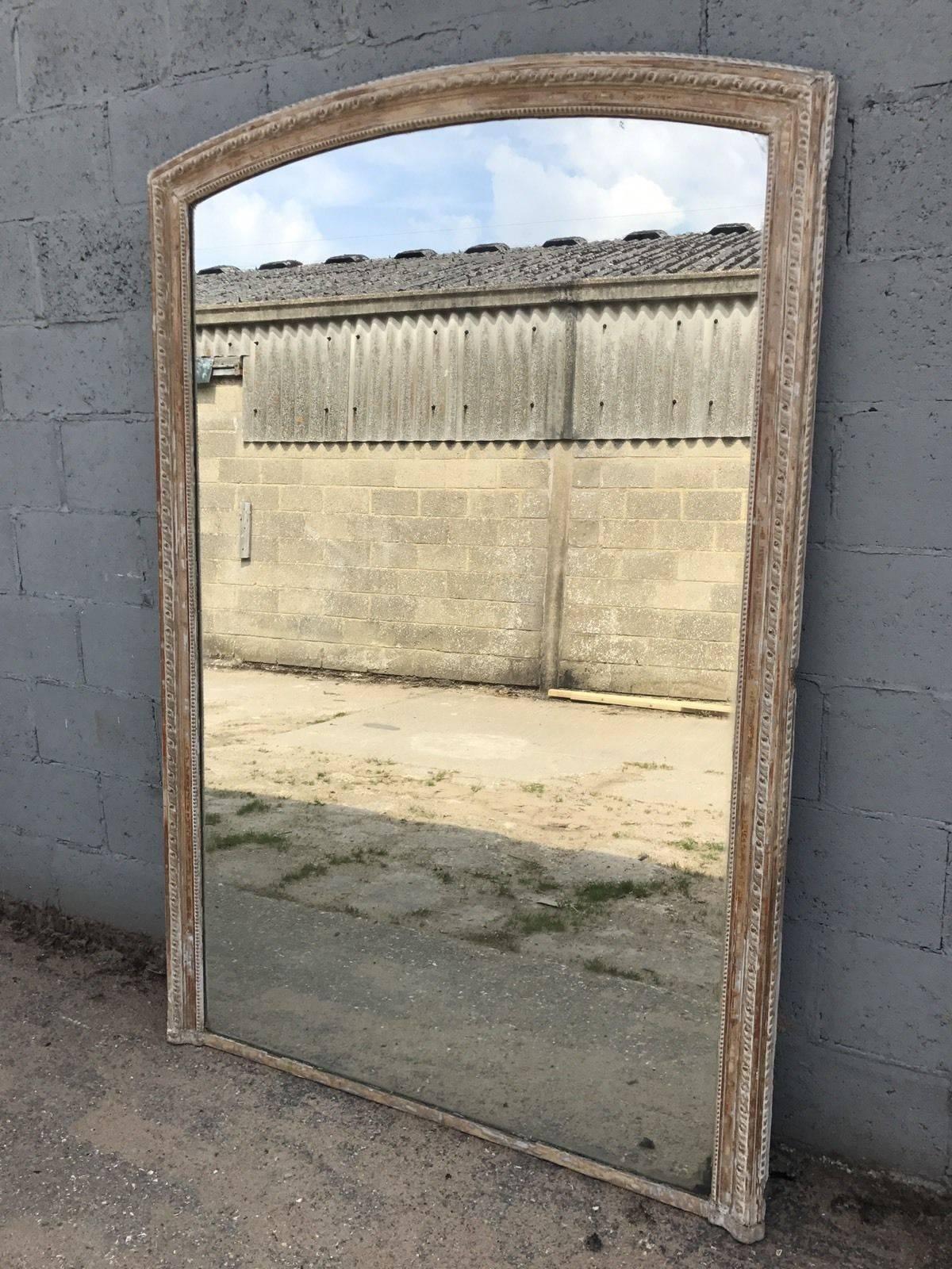 Here we have a stunning antique french mirror. Painstakingly dry-scrapped taking many hours, to reveal the beautiful layers of paint and gold gilt over the years.

The glass is amazing!! Superbly foxed as it's the original mercury. Very very hard