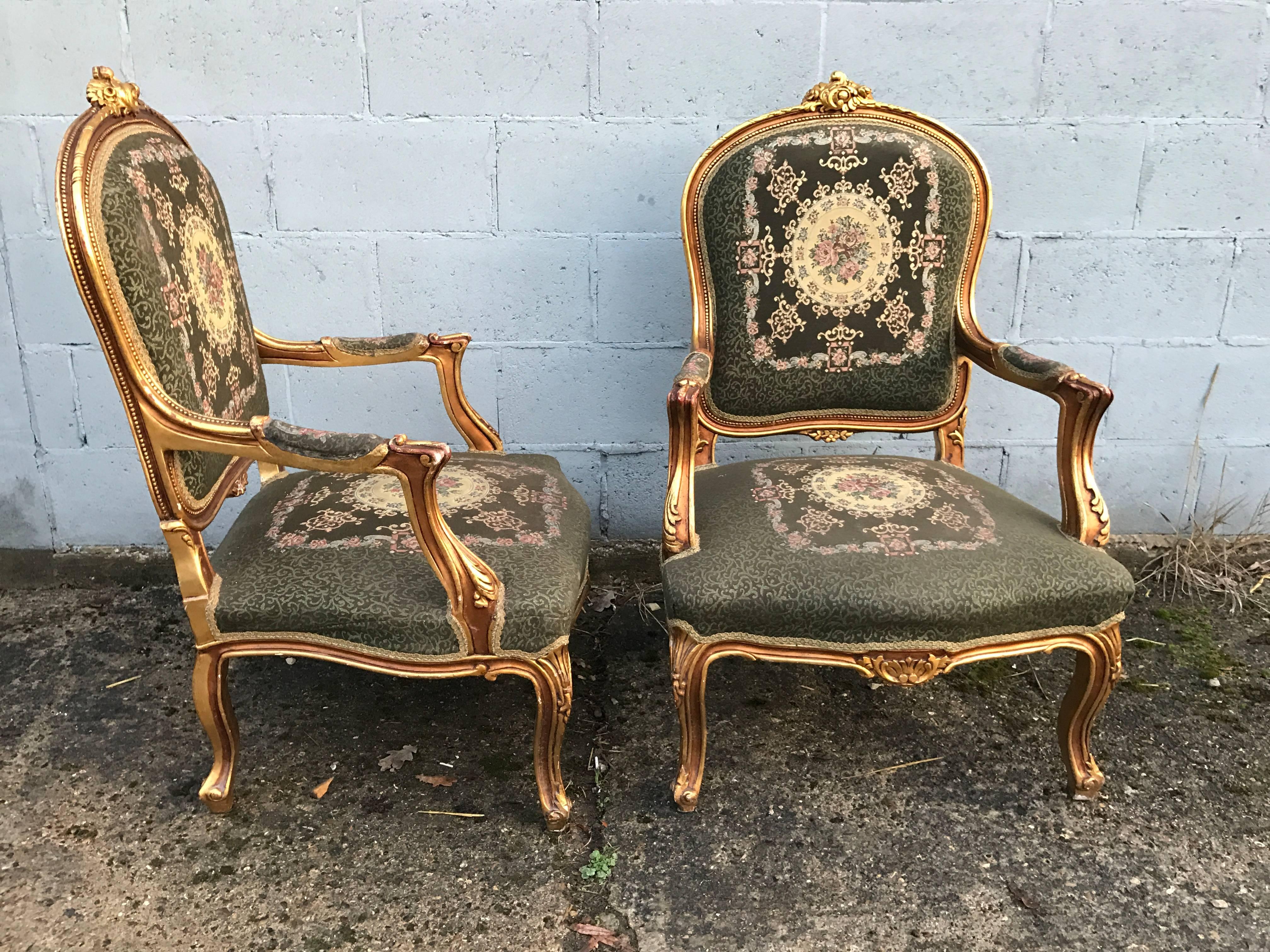 Here we have a beautiful French Rococo pair of chairs. The giltwood work is in fantastic condition, along with the beautiful fabric. 

Matching sofa in another listing.