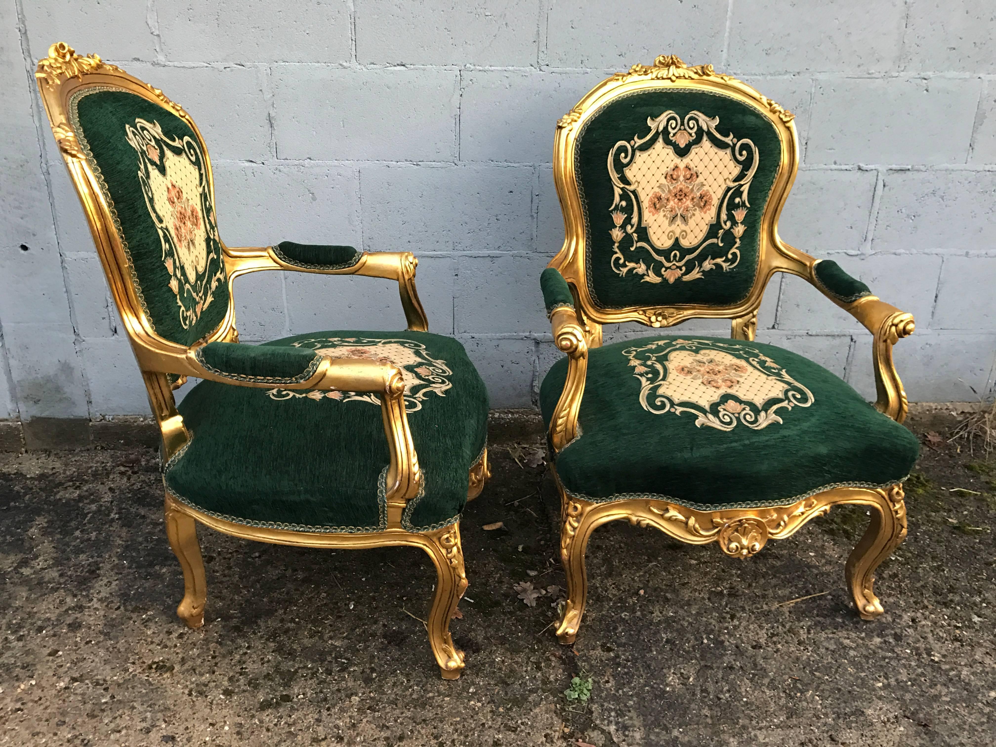 A lovely pair of French boudoir chairs from the 1940s. Original gilt frame, ever so slightly distressed in places.

Original upholstery, extremely clean for the age. No rips, tares or stains. Lovely color and pattern design.