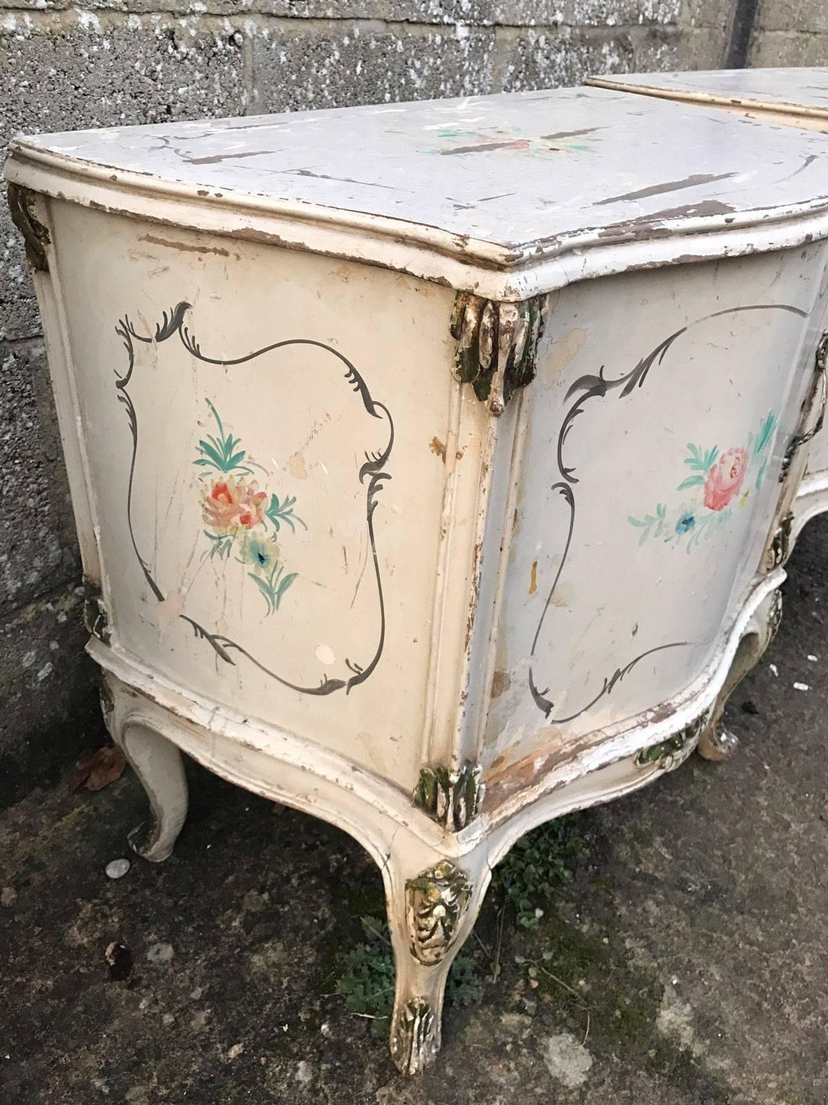 A very shabby pair of French bedside tables. Distressed and original, they consist of a cupboard. Structurally sound but very chipped and distressed, please view pictures! 

Matching suite in other listings. Please view to see the other pieces.