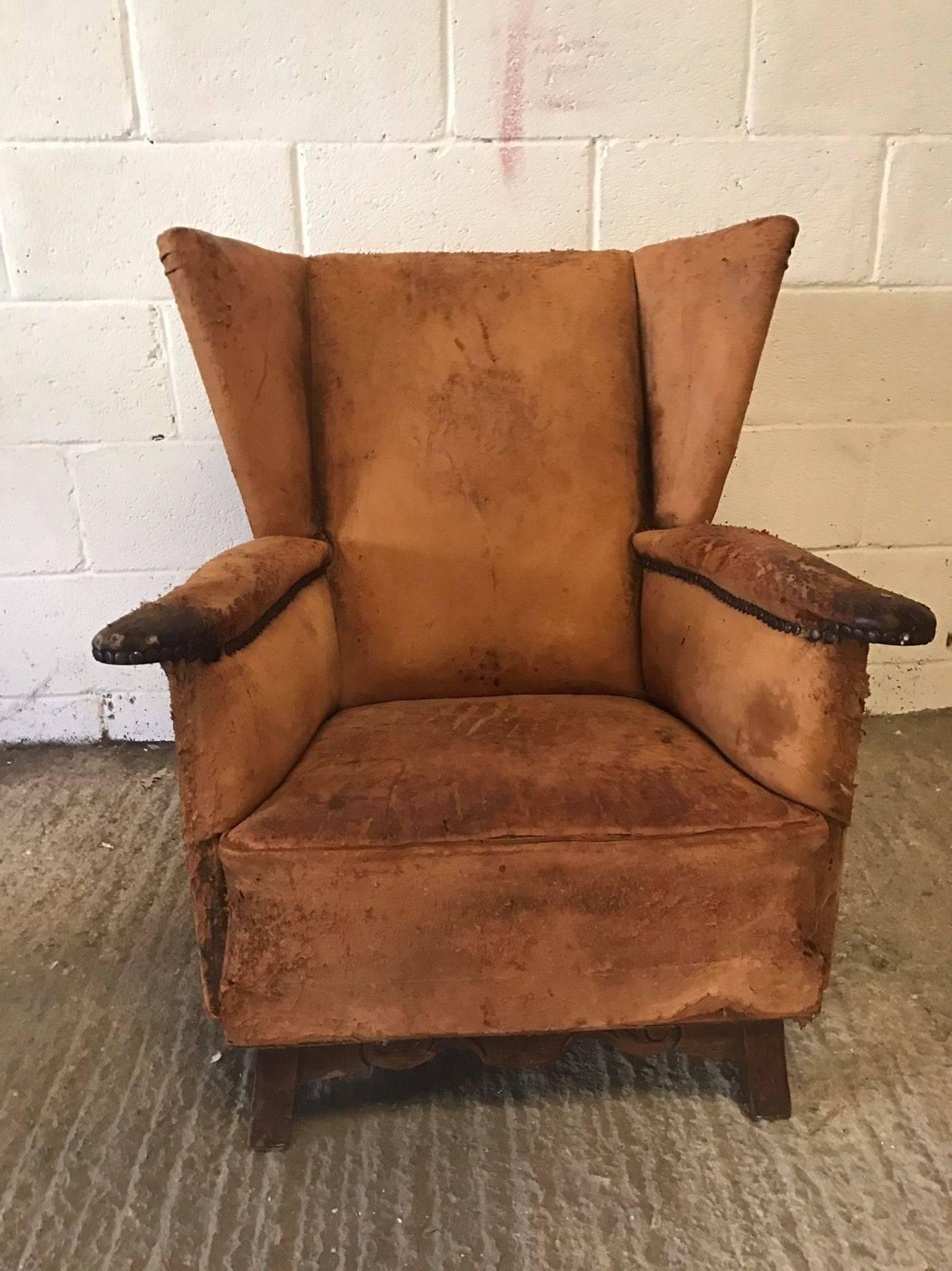 Beautiful and original French leather club chair. Distressed and aged, stood the test of time.

Structurally sound, leather is very distressed. Very unusual shape, not seen many like this before.

 