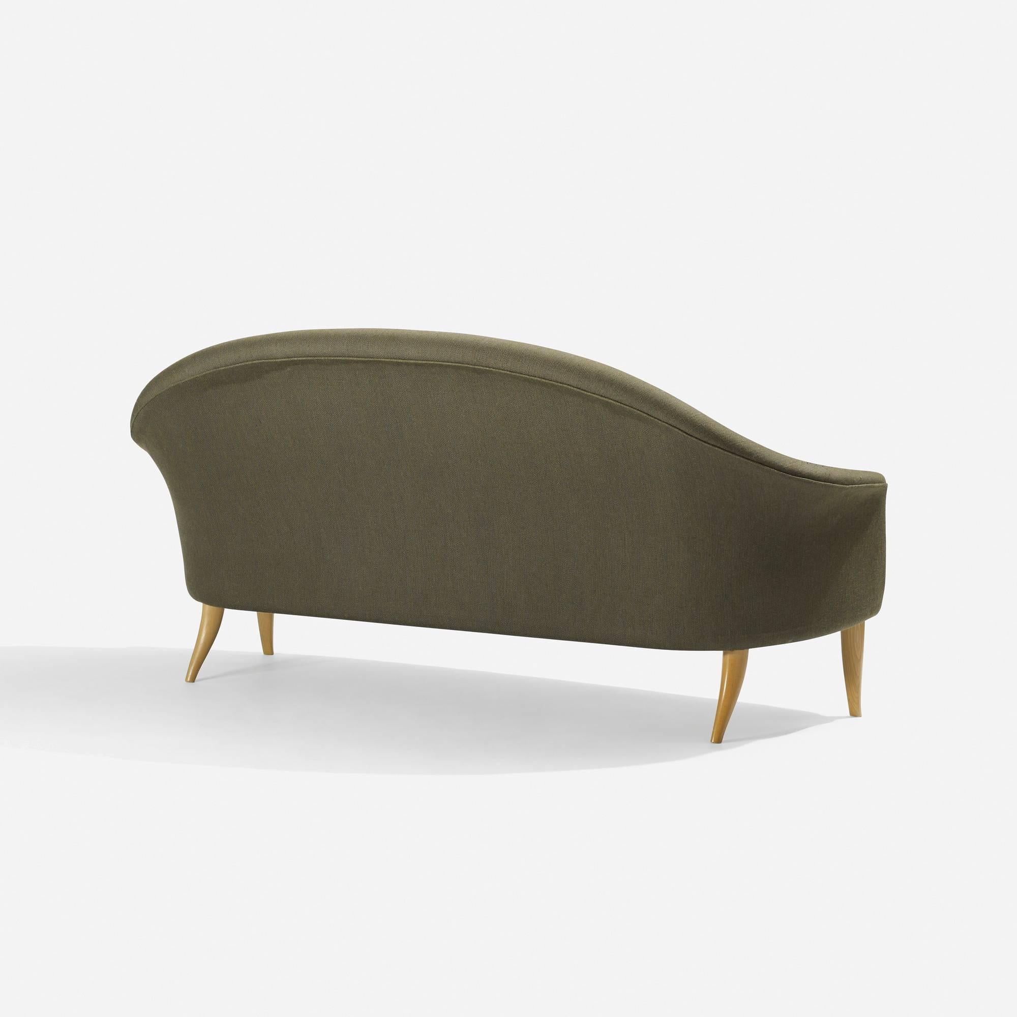 Paradise sofa by Kerstin Hörlin-Holmquist, upholstered button tufted tight back with exposed Beech wood legs. Signed with applied foil manufacturer's label on underside.