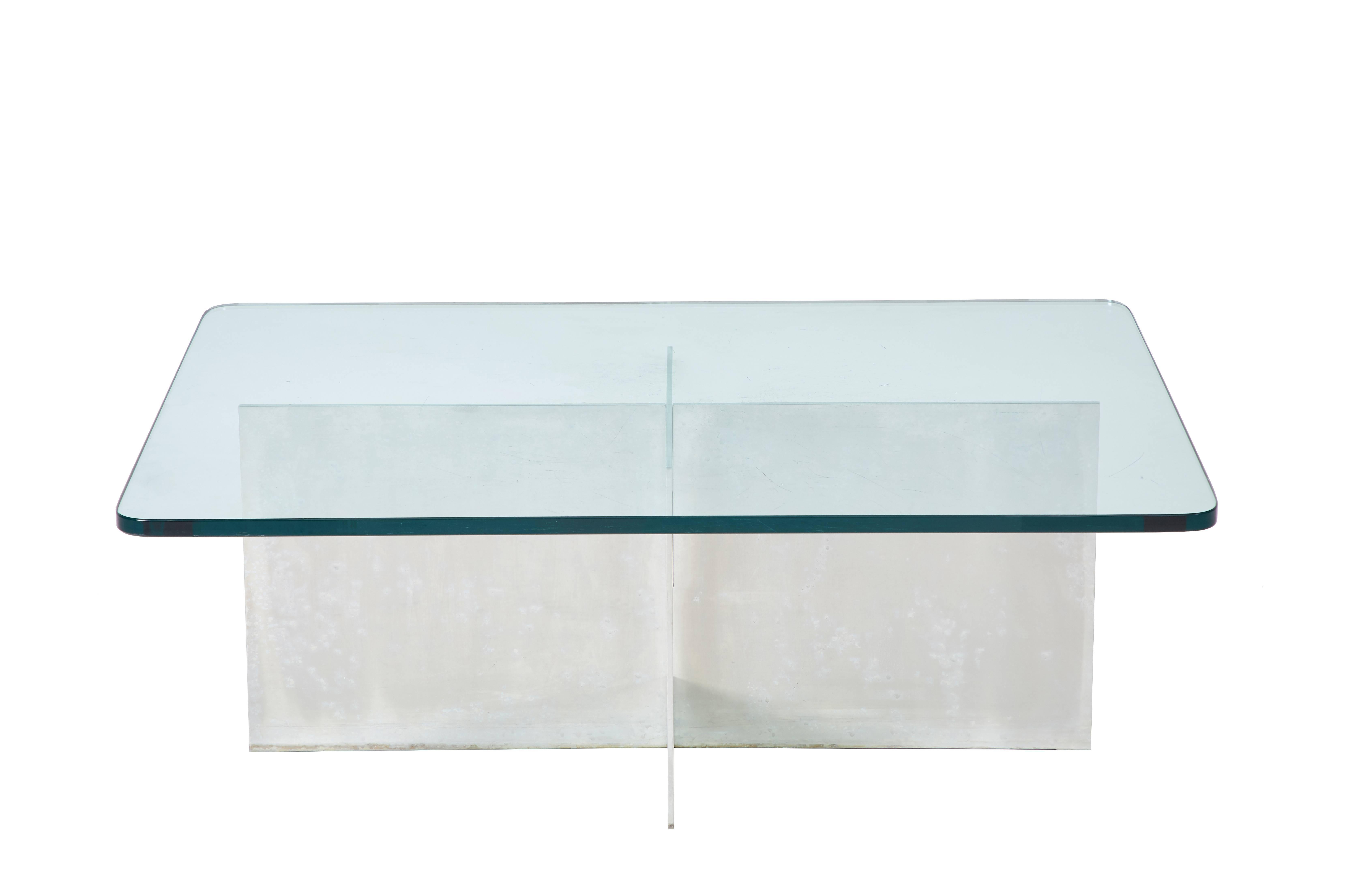 5' ft coffee table by Paul Mayen for Habitat with "x" aluminum base and thick glass tabletop, base impressed with model number, American, circa 1970s.

