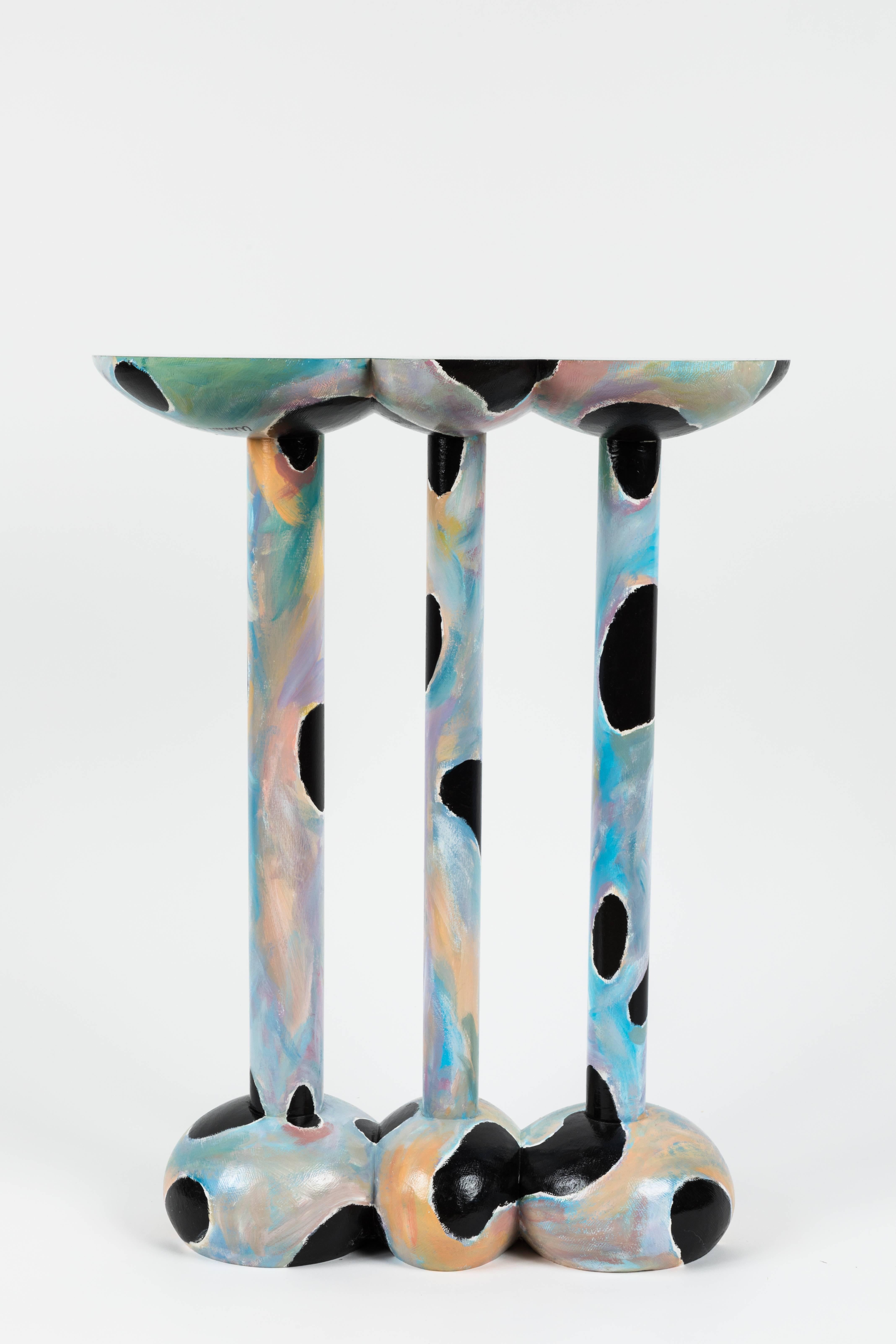 Hand-painted, hand-carved side table by Wendell Castle, American, 1987. This important table is featured in Judith Gura's new book on Postmodern design. Signed and dated.