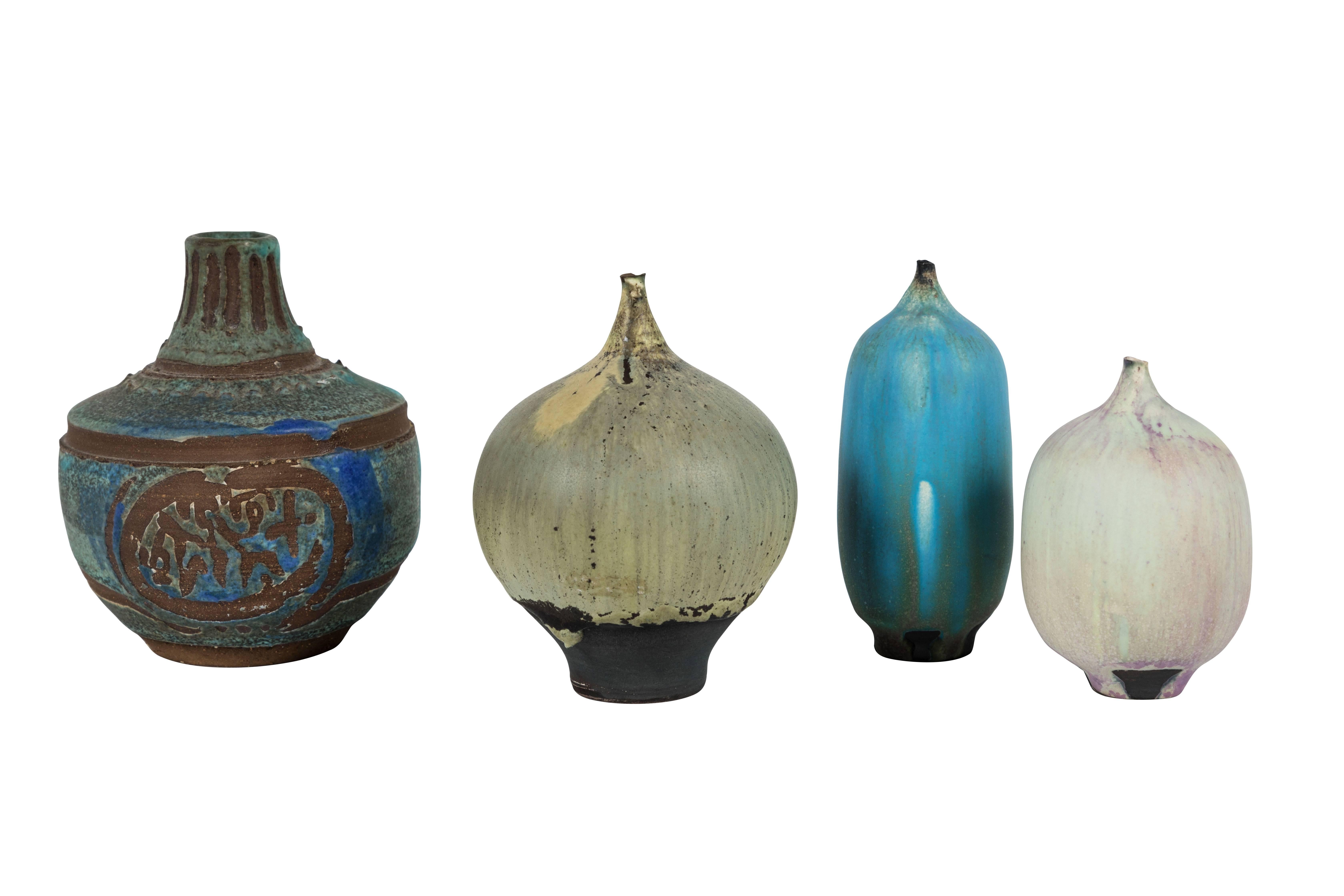 Assembled grouping of four 'Feelie' vases by Rose Cabat (1914-2015). Petite scale, beautiful, soft forms with Cabat's signature innovative glazes. Largest size listed for dimensions. Signed. Would consider breaking up set.