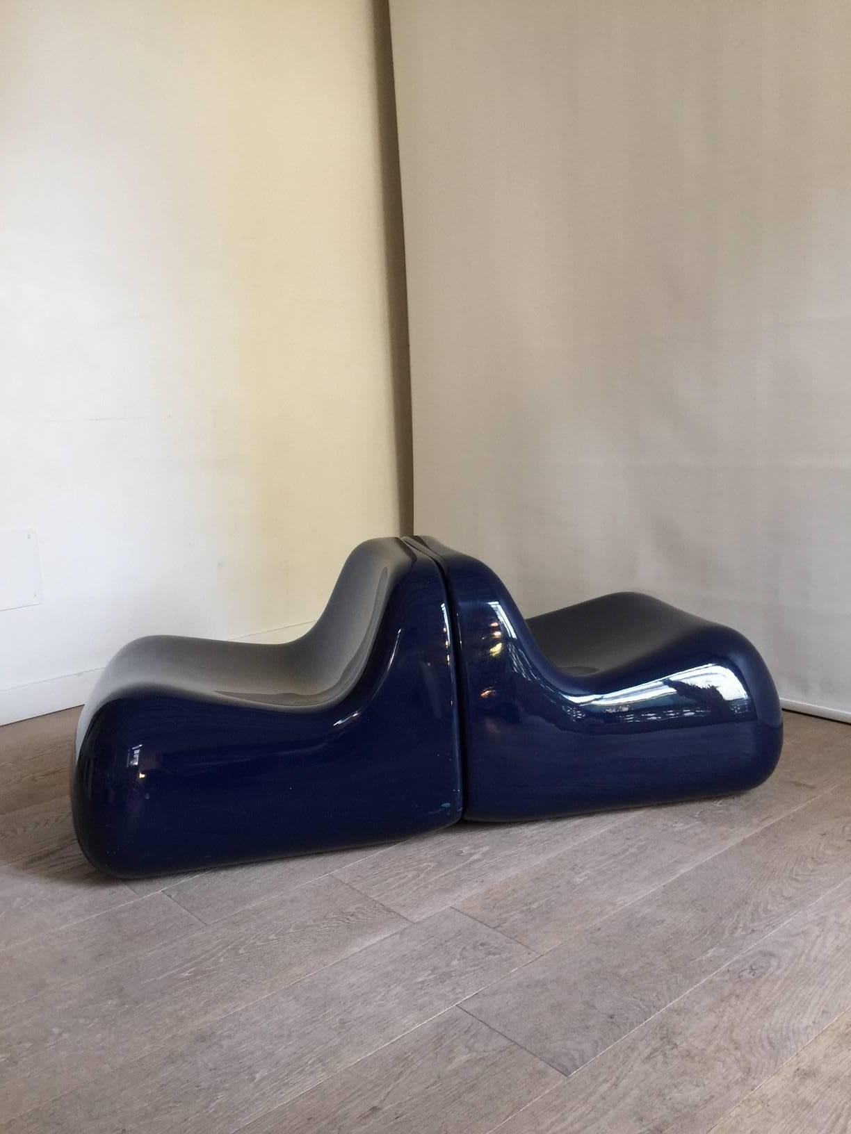Outstanding example of Space Age Minimalist fiberglass chairs designed by Alberto Rosselli for Saporiti in 1968. The chairs are made from blue lacquered fiberglass. This set remains in very good condition.
