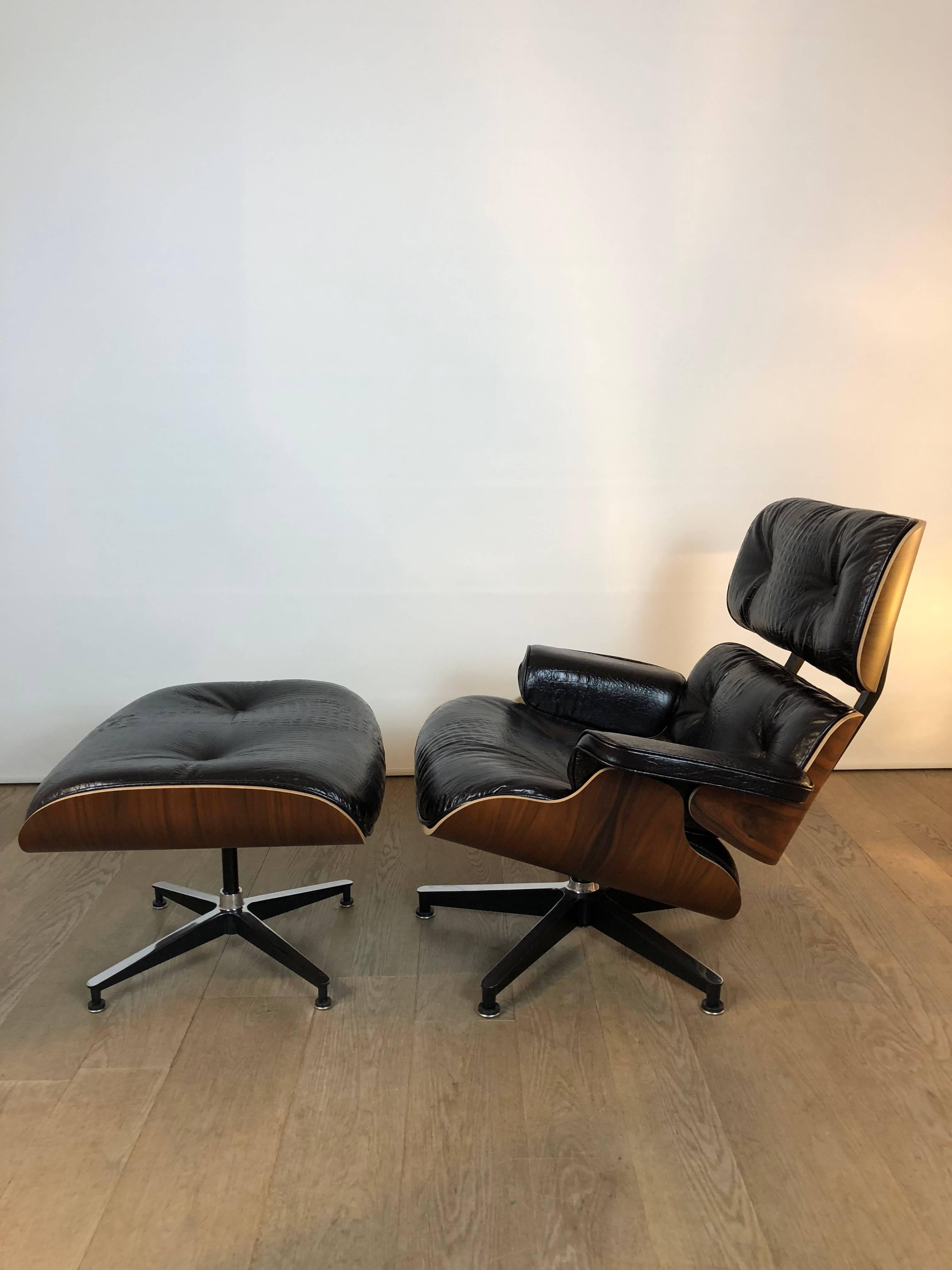 Iconic lounge chair with ottoman designed by Charles & Ray Eames, rosewood and dark brown crocodile print leather, Herman Miller edition, perfect conditions.