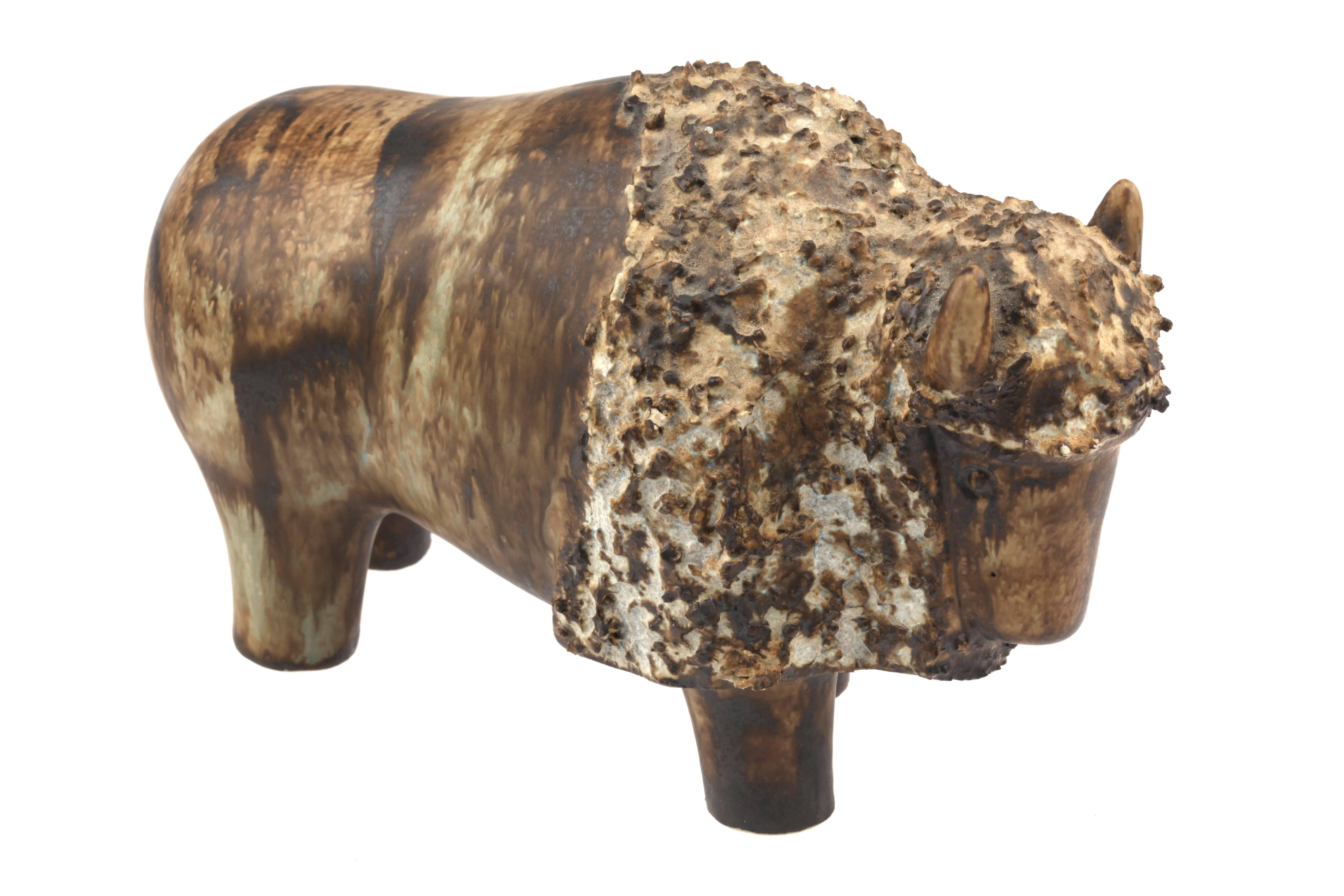 Vintage Mid-Century Ego Stengods Lidkōping Swedish ceramic bison, Bisonoxe. Designed by Heinz Schlichting. Made in Sweden.
Ego Stengods was a ceramic factory founded by Willy Fischer and Gösta Olofsson in 1966. Willy Fischer worked previously for