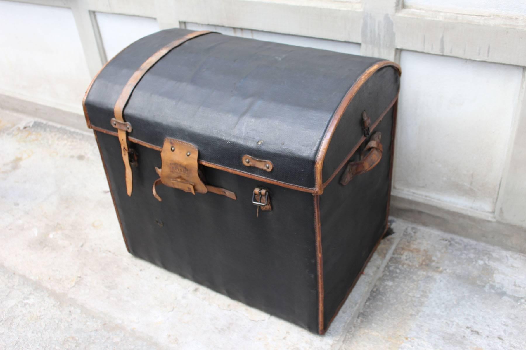 Black leather trunk Moynat, Paris.