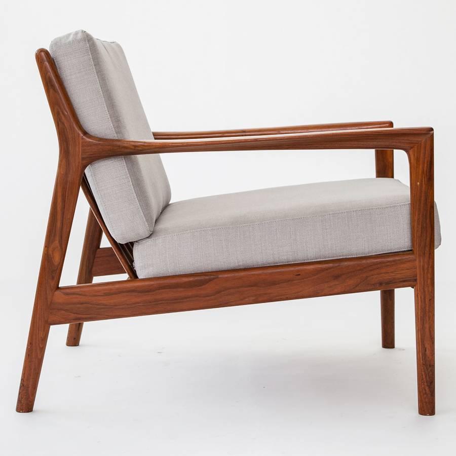 Pair of “USA-75” lounge chairs , in walnut with loose cushions in fabric.
 