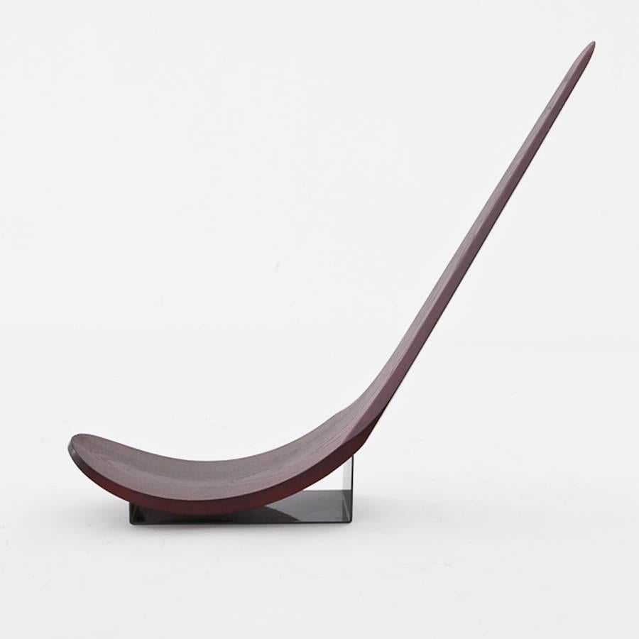 Carlo Mo “Chip” chair carved oak, lacquered steel base. Limited edition.