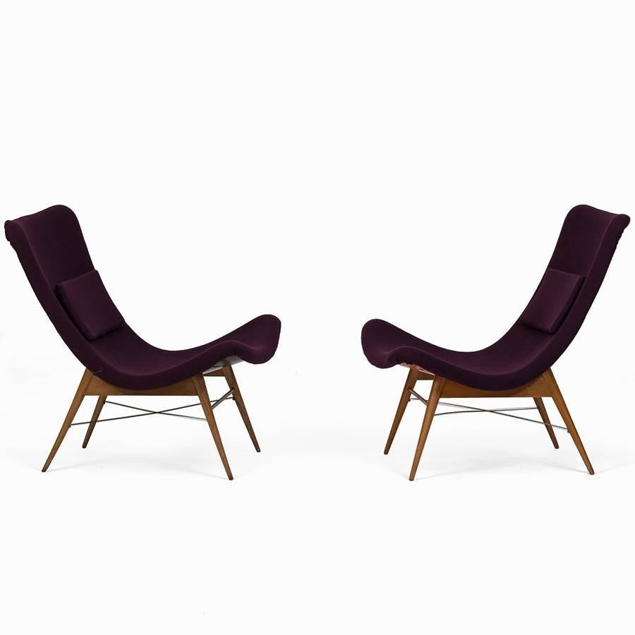 Miroslav Navratil 1950s Chechoslovakian Pair of Lounge Chairs produced by Tatra in beech and fabric.  A midcentury east-european classic. Excellent condition.