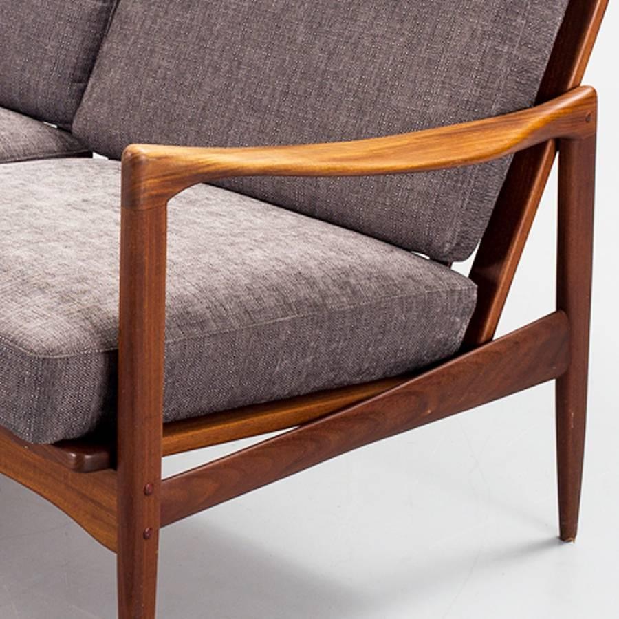 Danish  Ib Kofod-Larsen 1960s Kandidaten Sofa in teak and fabric produced by OPE Mobler For Sale