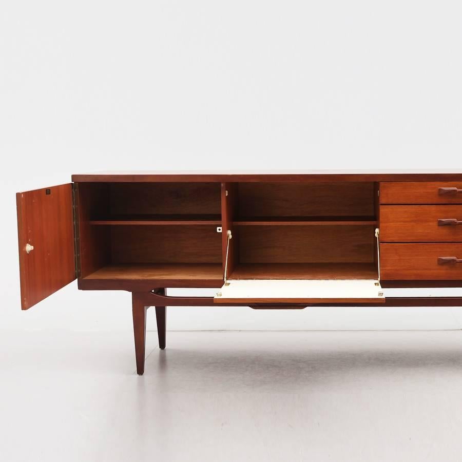 Woodwork Lovely Danish 1950s  sculptural sideboard in Teak with drawers and cabinet For Sale