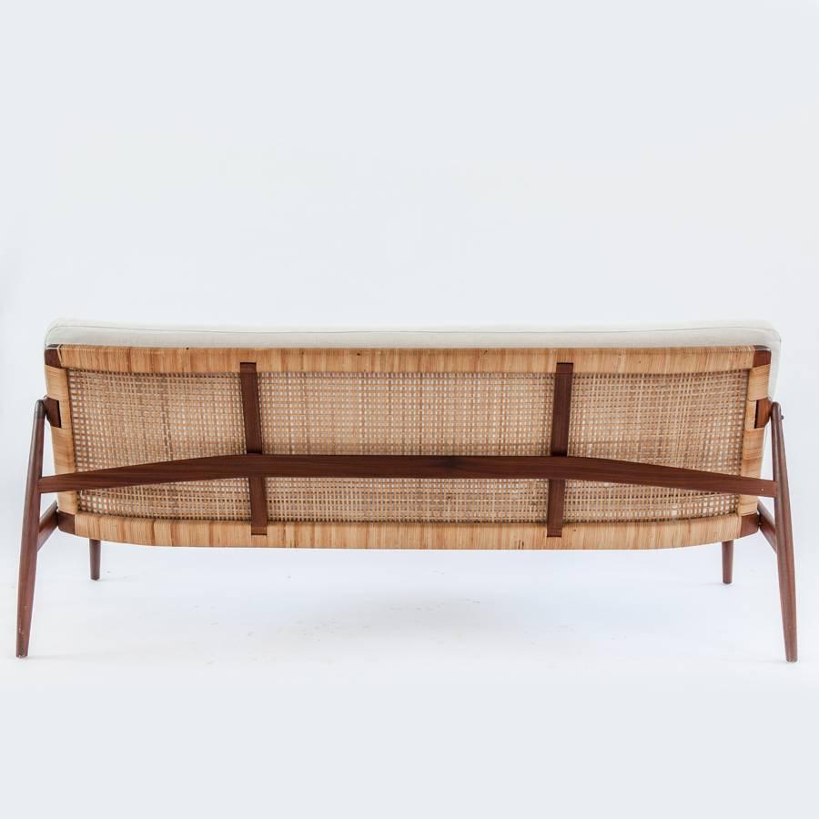 Mid-Century Modern Peter Hvidt and Orla Mølgaard-Nielsen 1950s sofa in teak, backrest in rattan