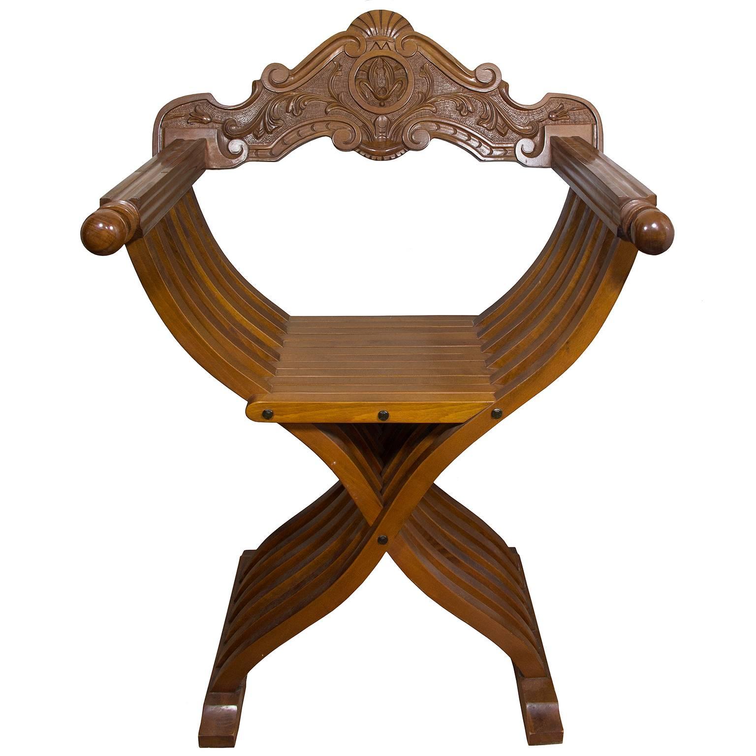 Beautiful typical Florentine Renaissance style carved wood folding Savonarola chair.
Excellent vintage condition. 


Measurements:
Height: 84 cm / 33.1 inch,
width: 65 cm / 25.6 inch,
handle length: 45 cm / 17.7 inch.


A type of folding