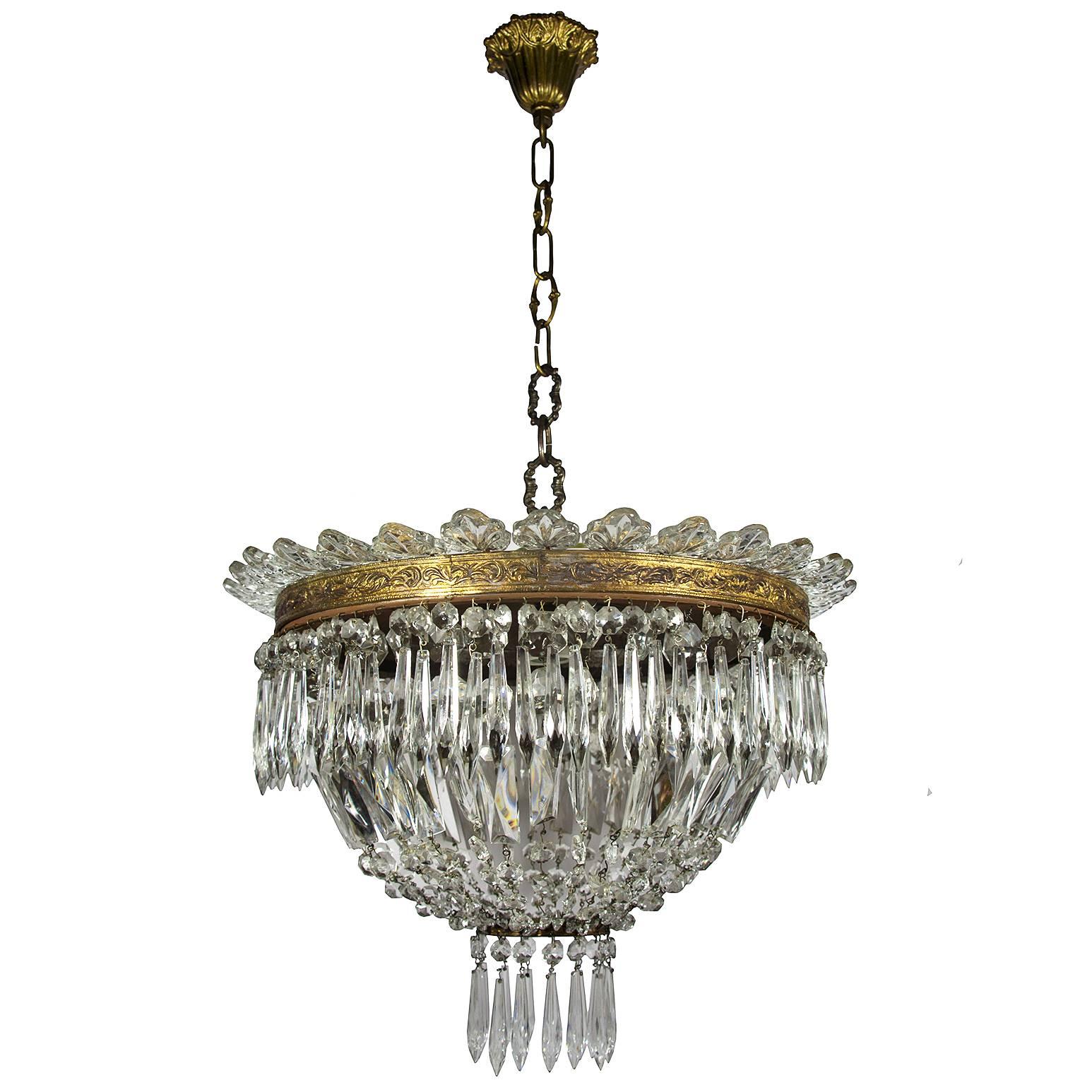 Stunning antique Empire style Italian crystal chandelier with Venetian Murano Leaves
Very good vintage condition (please see photos)
Rewired, you must use professional electrician service to set it up. Three-light bulb sockets
Acquired in Italy,