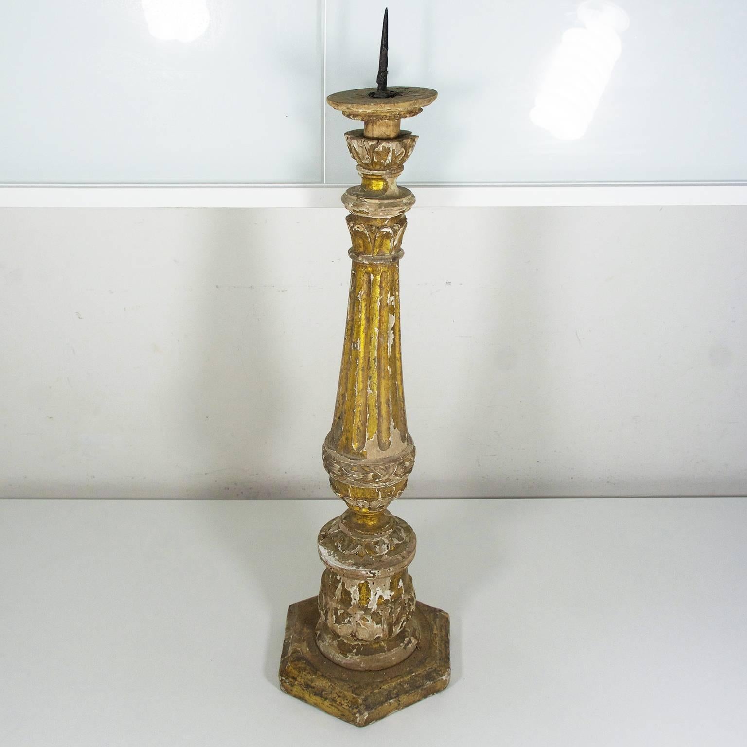 Antique Italian giltwood church altar candlestick,
mid-1700s.
Beautiful original condition - losses to surface and paint (please see all photos), old woodworm holes which are typical for antique wood items.

Measurements:
Height without needle: