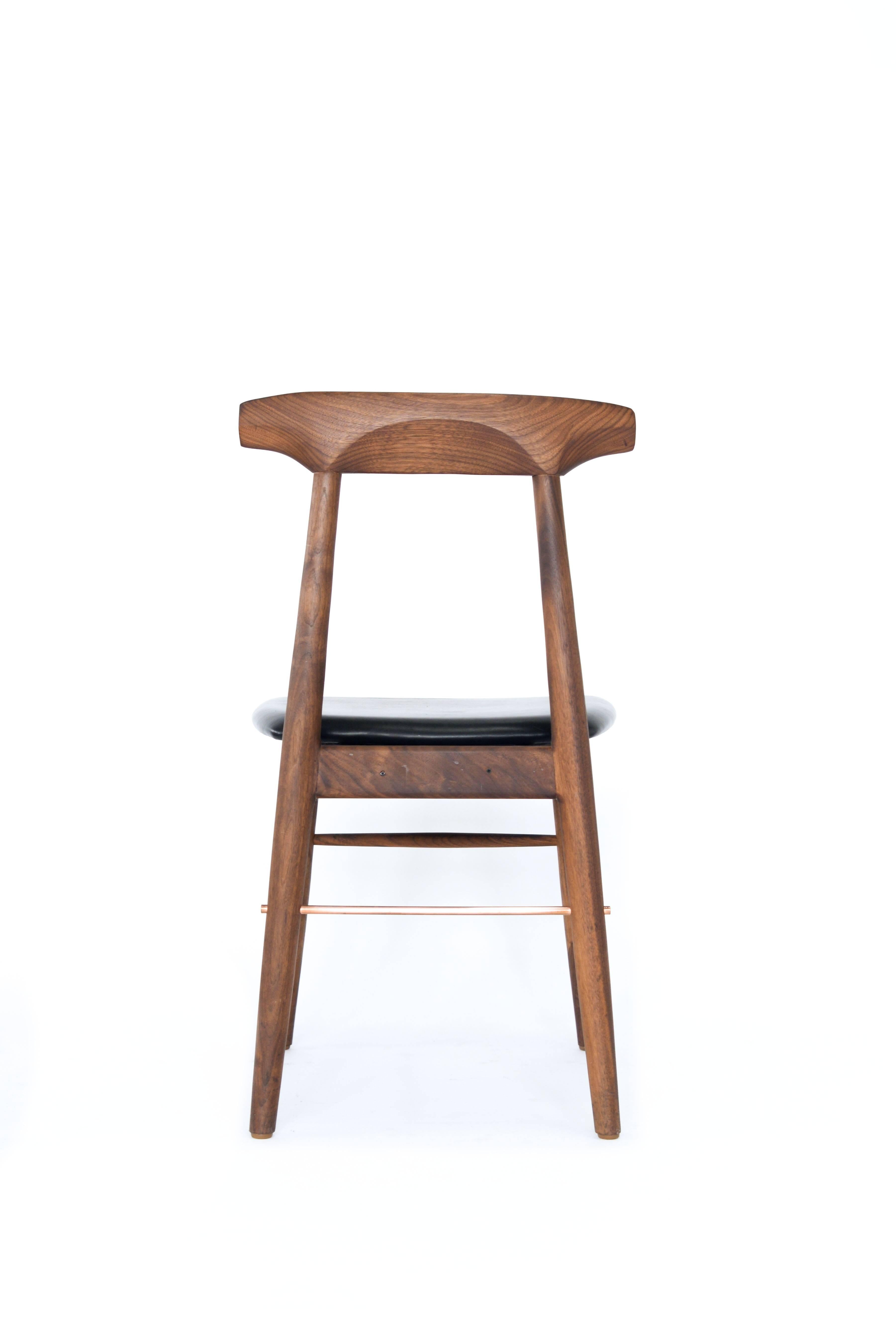 Handcrafted solid wood construction, featuring true copper or brass rods. Made in Los Angeles, California. Shown in walnut, copper, and black leather upholstery.

Wood type is available in ebonized oak, white oak, solid walnut, maple, ash, and any