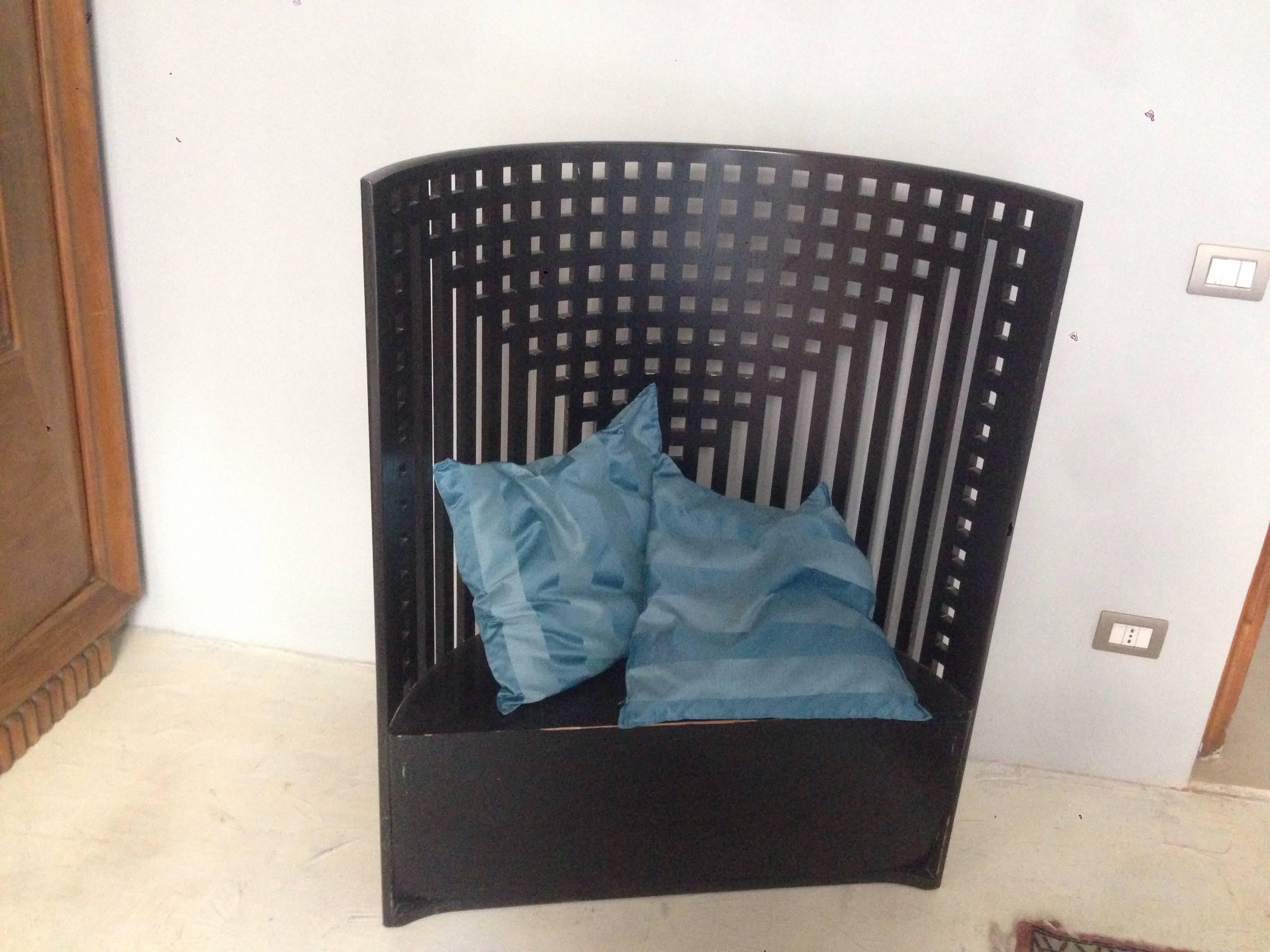 Charles Rennie Mackintosh created the willow chair (Settee) for the Willow Tea Room in Glasgow, Scotland between 1902 and 1904. 

Measures: 119 cm H x 94 cm W x 41 cm D.