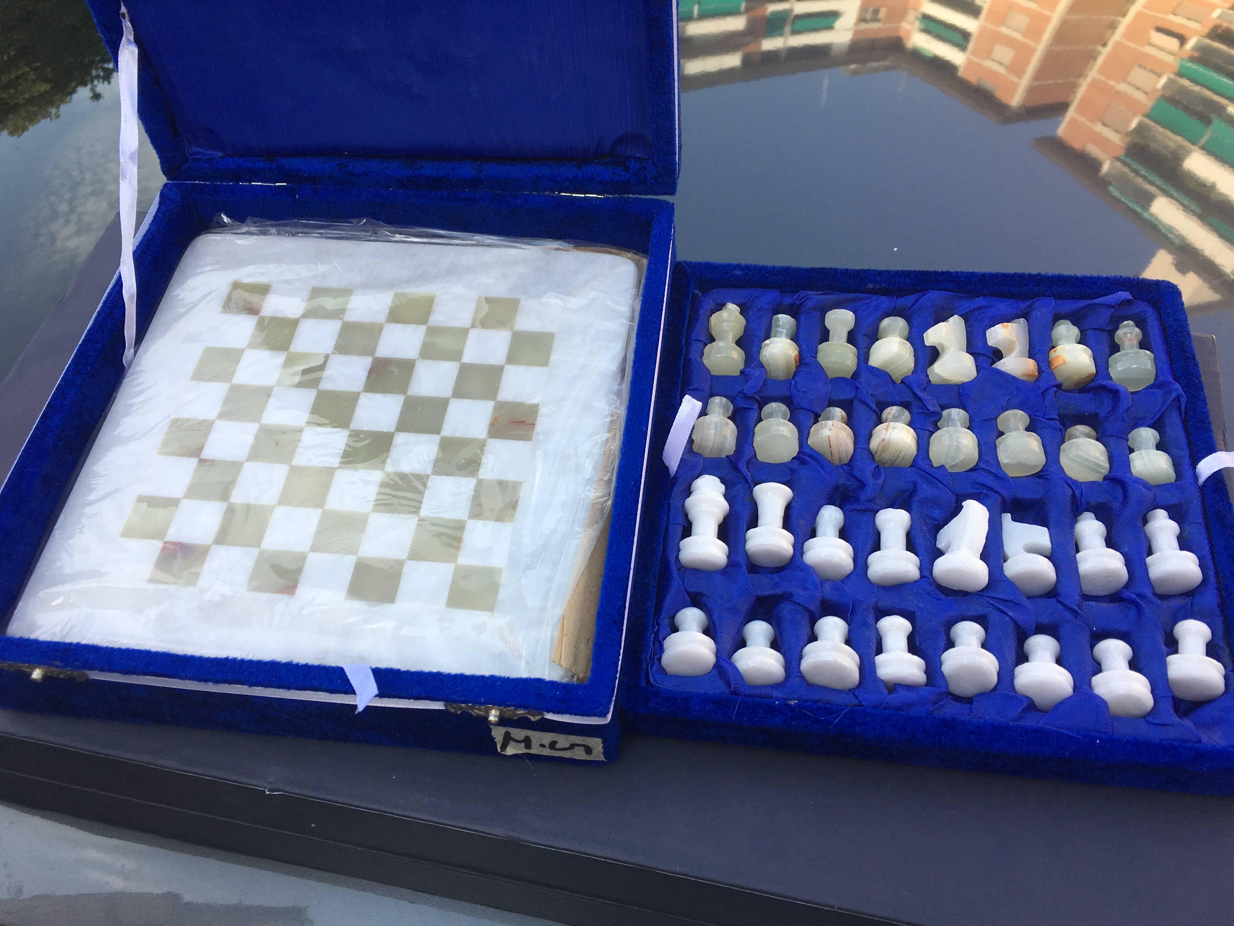 Unique Onyx chess set. Beautifully hand-carved from Onyx gemstone and white marble stone. This chess displays their own natural stone characteristics, blending banded shades of green, honey and brown. Genuine white marble provides a rich contrast,