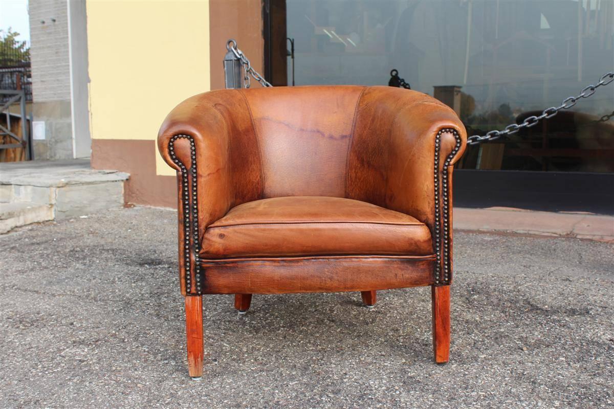 Beautiful pair of round shape Italian brown leather club armchairs. The price is per item / armchair.

 77.00 CM / 73.00 CM / 68.00 CM.