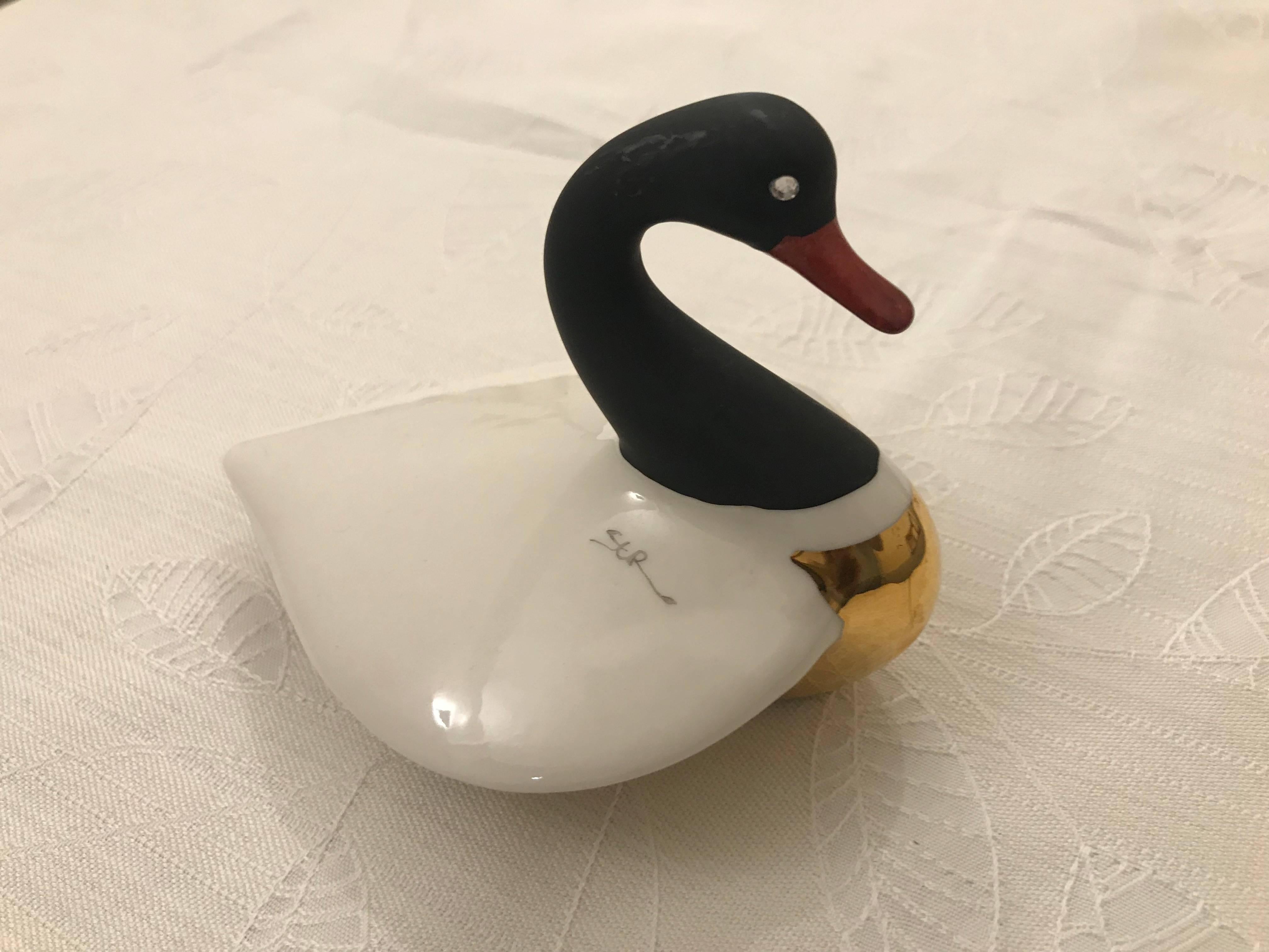 Beautiful small porcelain duck / swan by Capodimonte, signed.

INTERNATIONAL SHIPPING
Our transportation of antique furniture and items is executed with utmost care and with personal flavour in order pick up or bring your precious order.
 
APPROVED