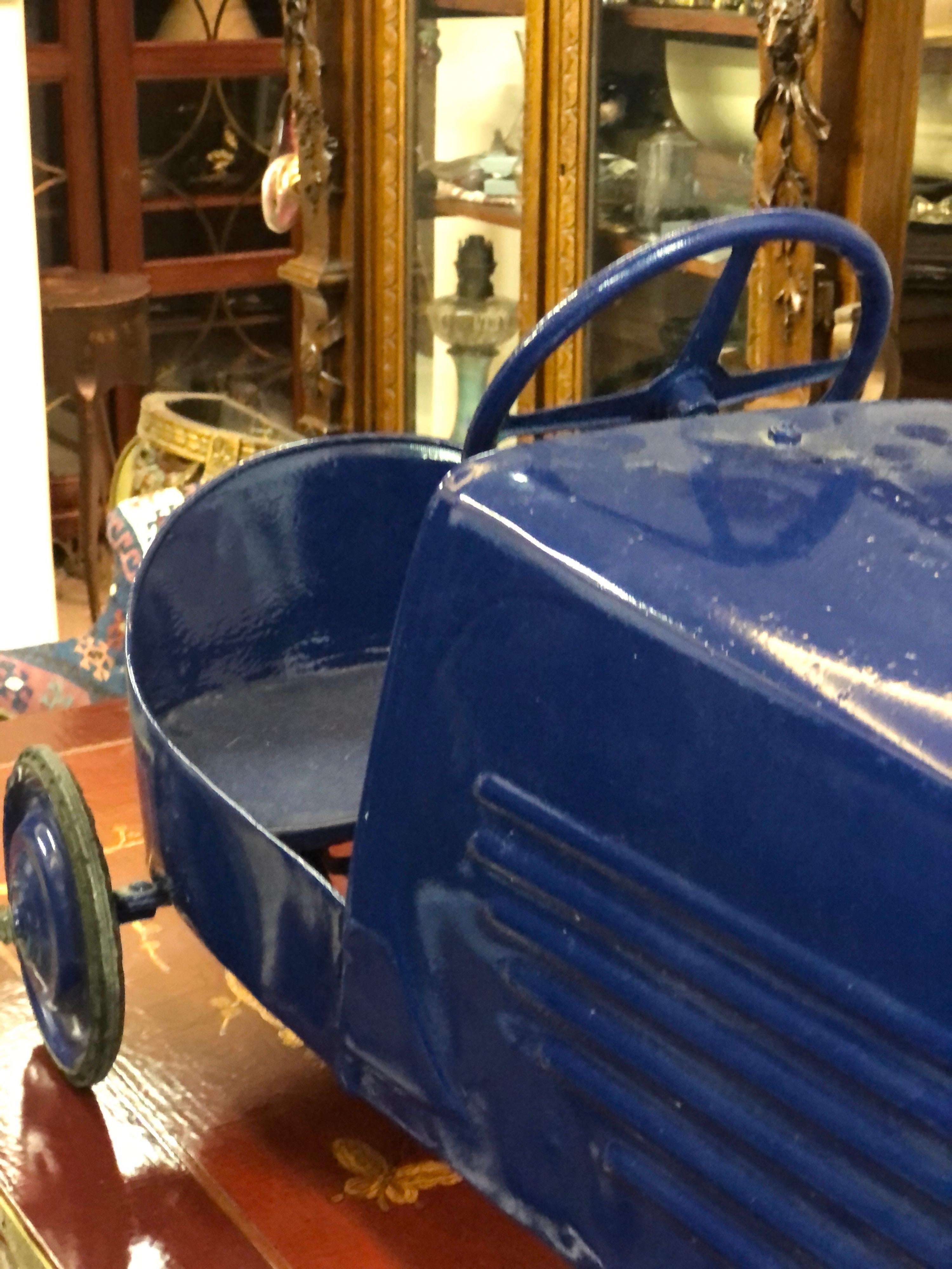 blue pedal car