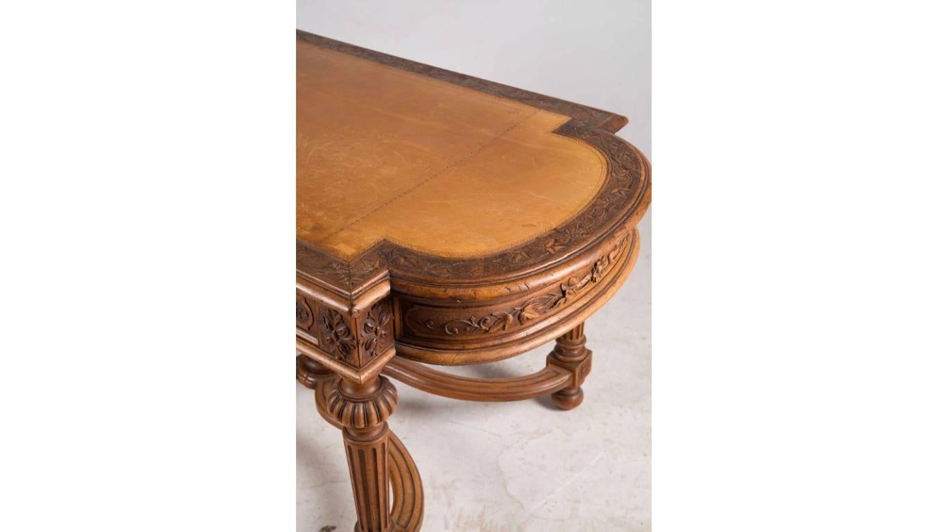 This is a sublime walnut writing table with twisted legs, two drawers, that features light brown leather top and has rich carvings in Henry II style, circa 1800
Measures: 73/138/77 cm.

 
