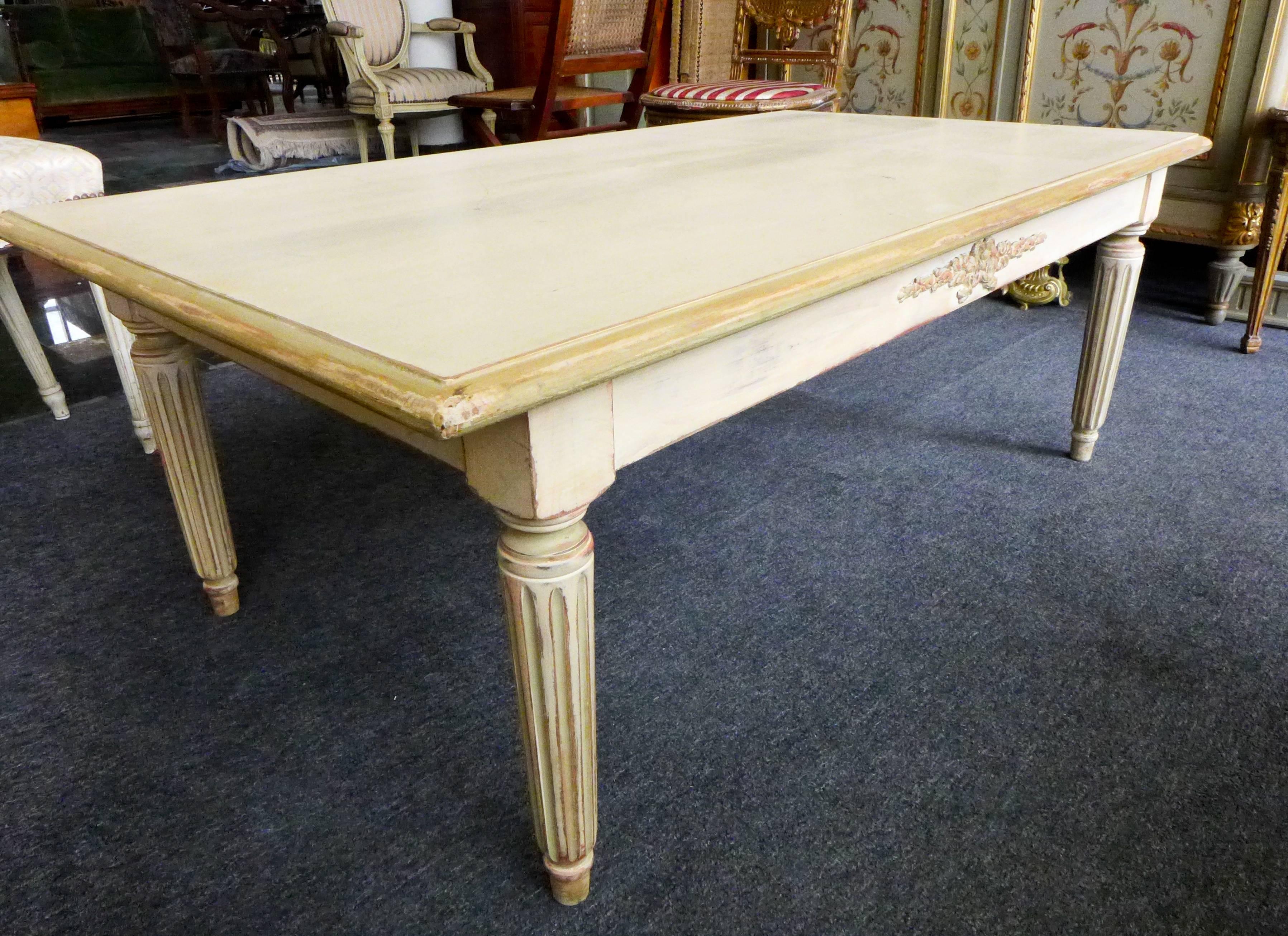 Exceptional 19th century hand painted Louis XVI solid wood table, circa 1860. Elegant legs with a typical ribbon on the both sides. Painted in light beige-green with a nice antique finish.
