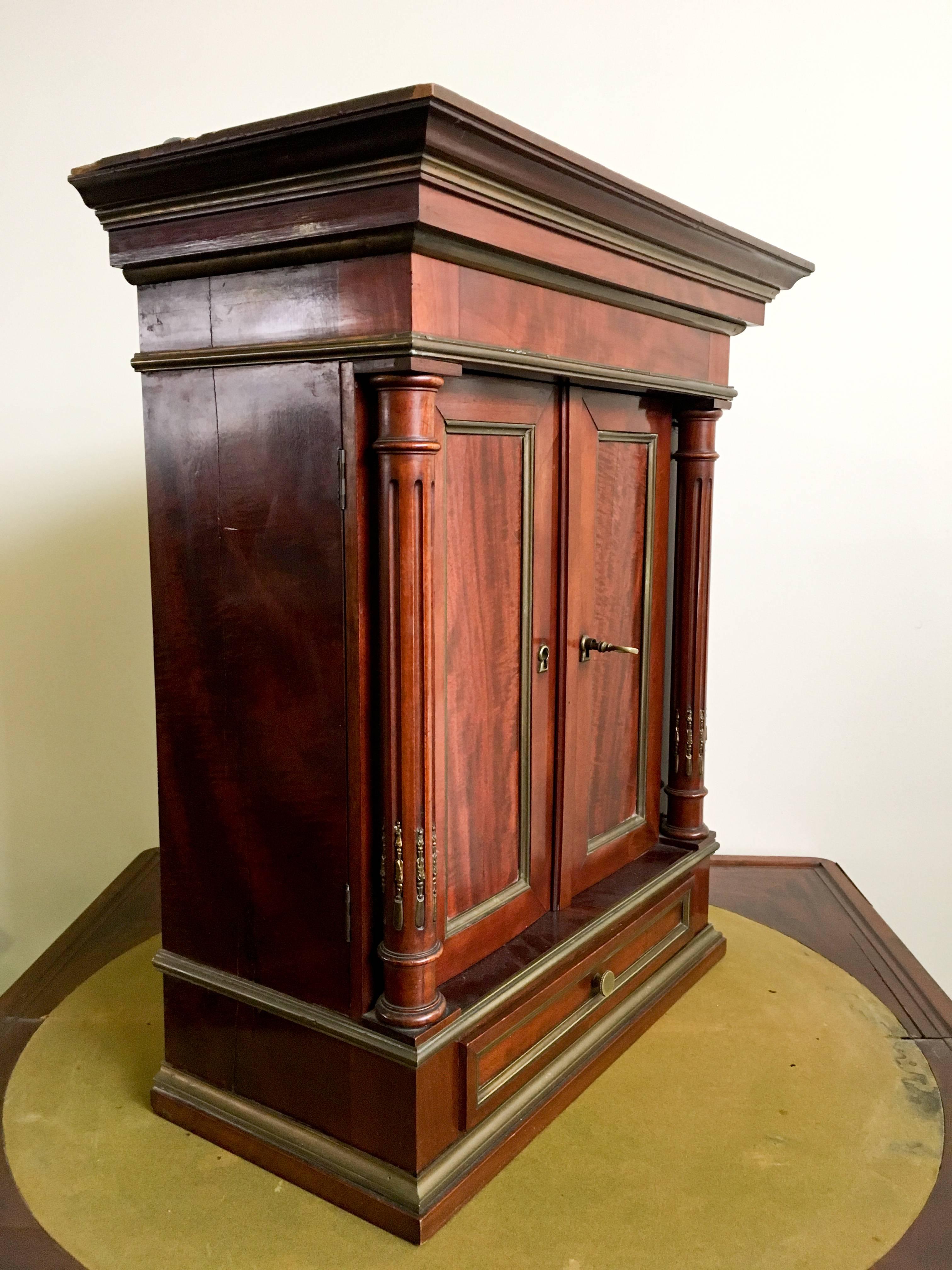 Exclusive mahogany cabinet from Louis XVI epoque.
With gilt bronze ornаments, brass cannelures and three shelves inside and a small drawer infront,
France, circa 1790. The piece is in good condition as you may see from the photos.