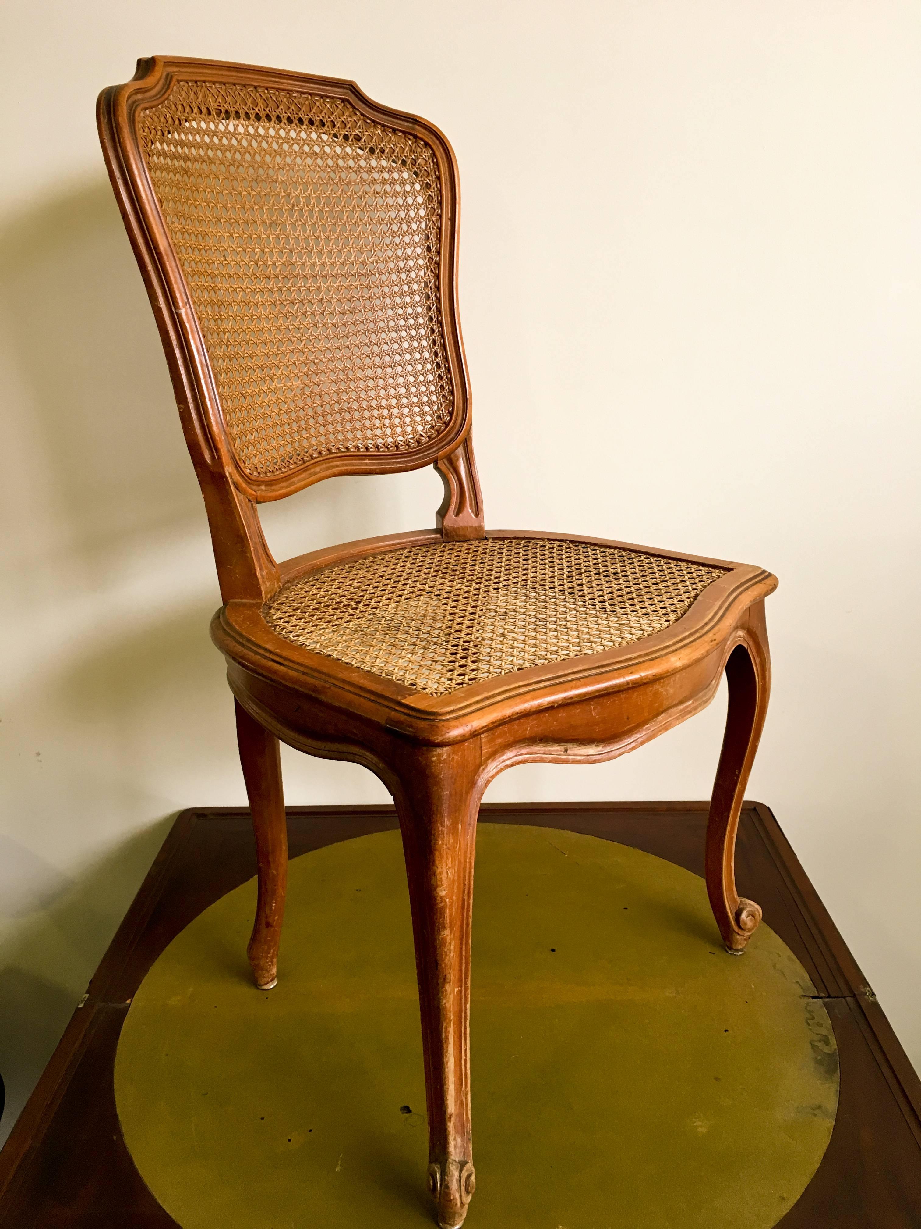 Set of six 19th century French carved walnut dining chairs in style of Louis XV.
With hand-caned seats and backs. The chairs are raised on elegantly carved cabriole legs. France, circa 1860 the chairs could be sold separately.
Good condition.