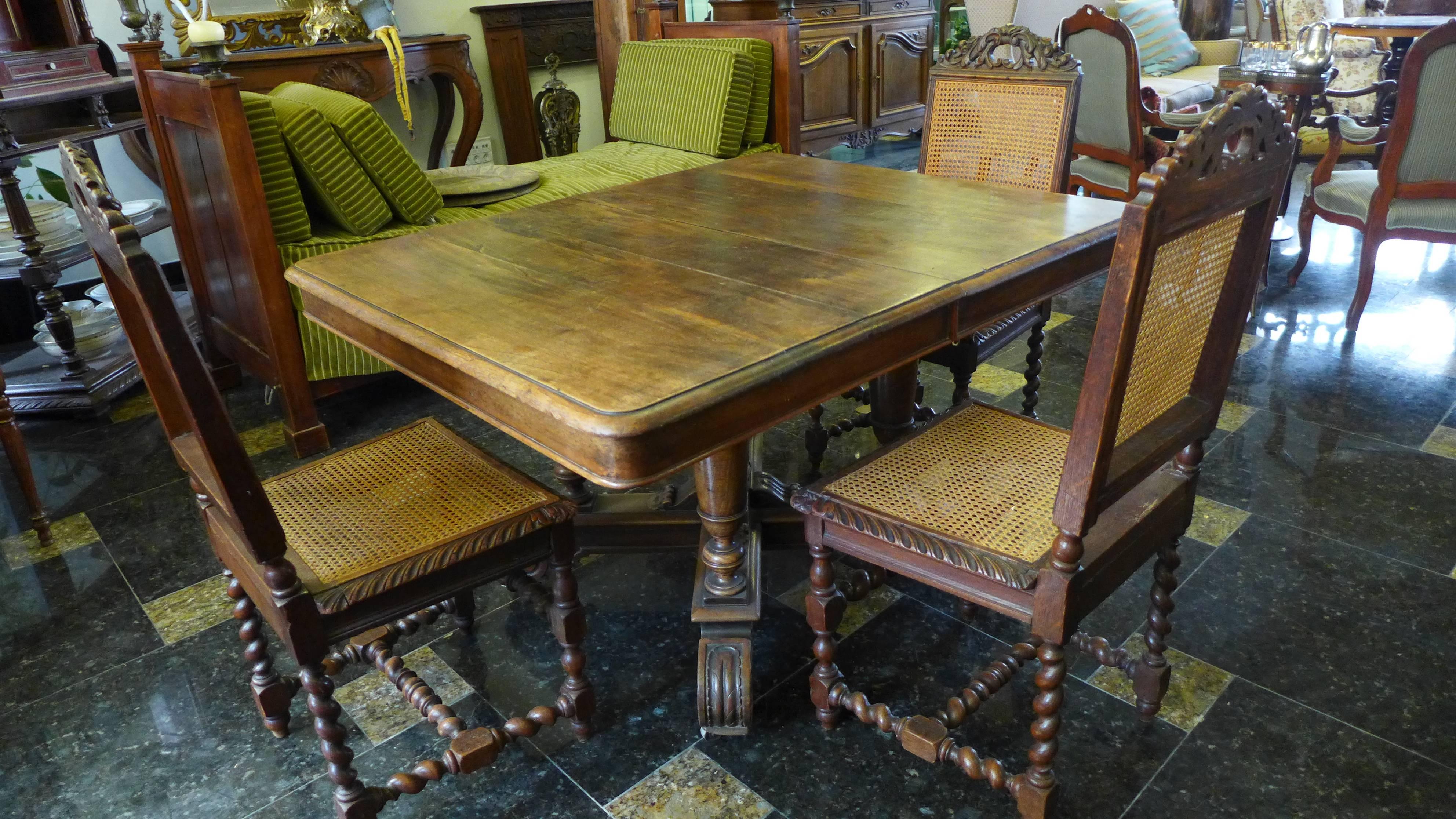 Antique French 19th century rectangle extending oak table with three separate extension leaves. The table has a beautiful centre pedestal support, and additional four hidden legs to support the table when it is extended. It needs a cover when