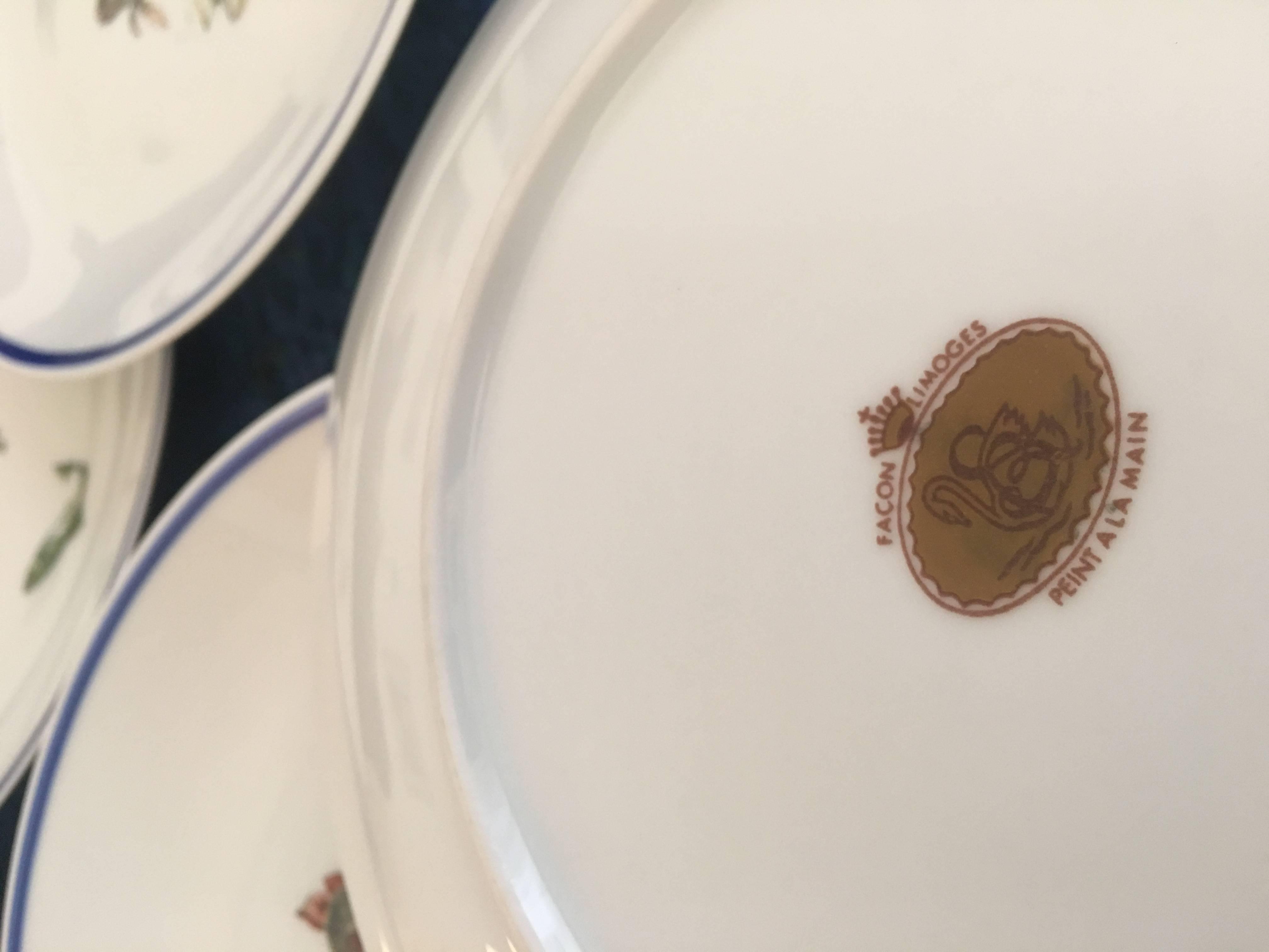 Nice vintage mid-20th century French porcelain dinner fish service set, seven plates, one large dish and six small. Transfer printed and later hand-painted.
Made in France, Paris.
The set is in mint condition.
Porcelaine - Fabriquee a Vierzon