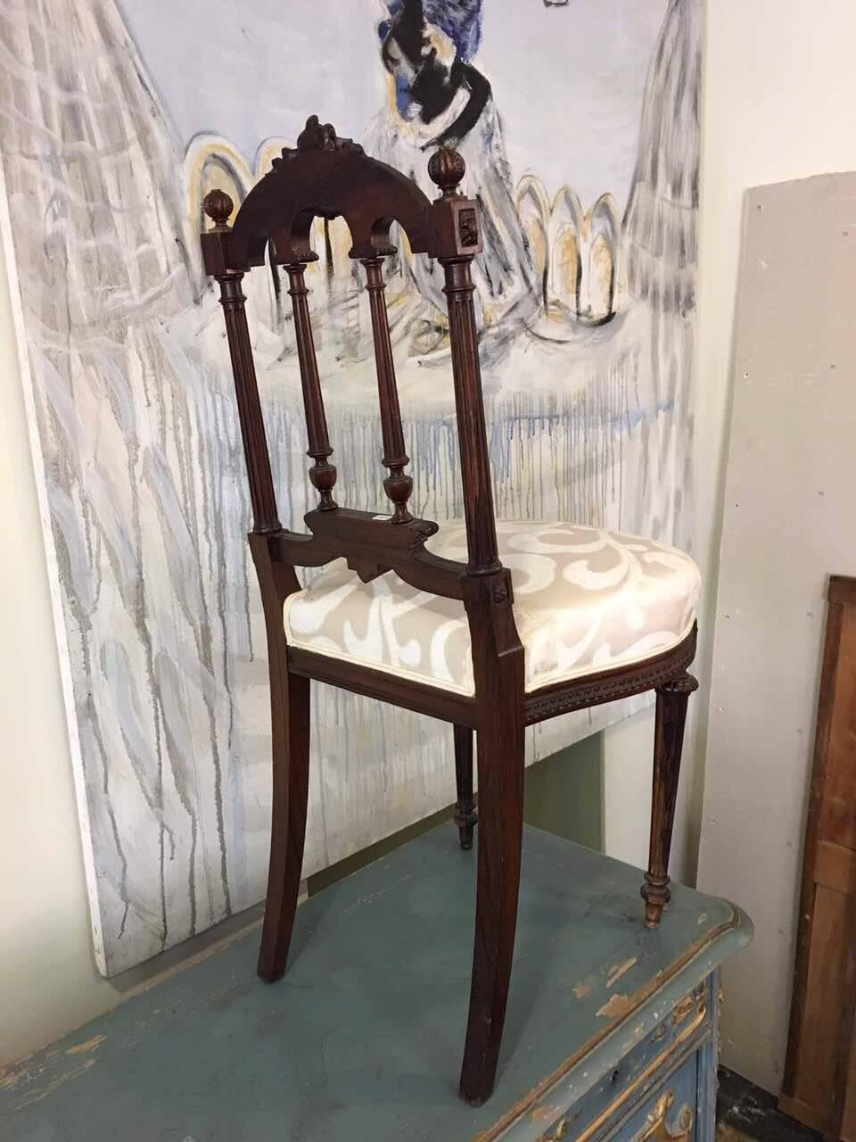 Pair of petite 19th century French beautifully carved walnut side chairs in Victorian style.
Very stable and comfortable with new white upholstery,
circa 1870.