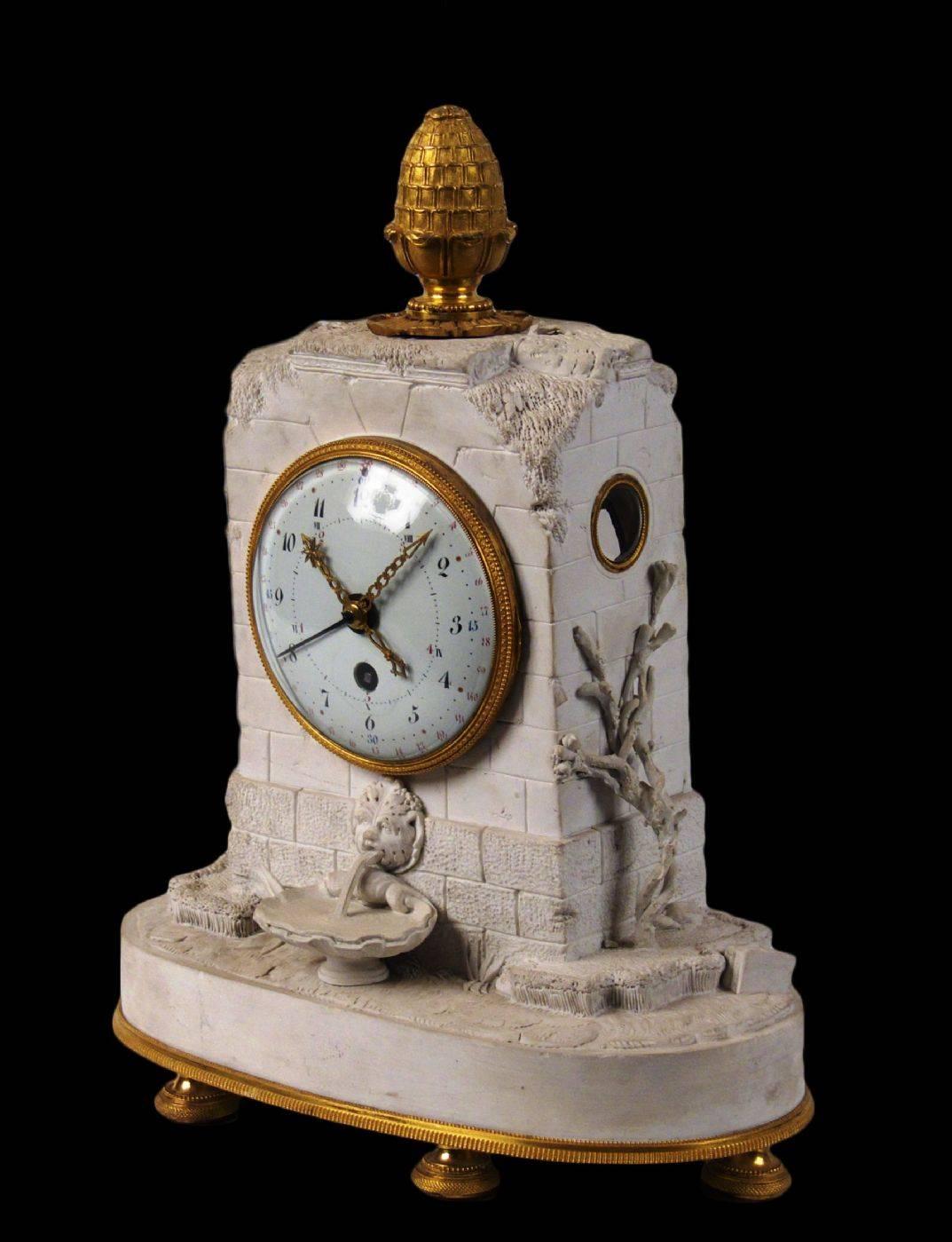 Clock. decimal
Manufacturing: France. Directorate (1793)
Sevrés fabric porcelain biscuit, embossed inside the "Costant" biscuit.
Enamelled dial by Couteau and golden bronze.
Measurements cm: H 35 x 27 x 12.5.