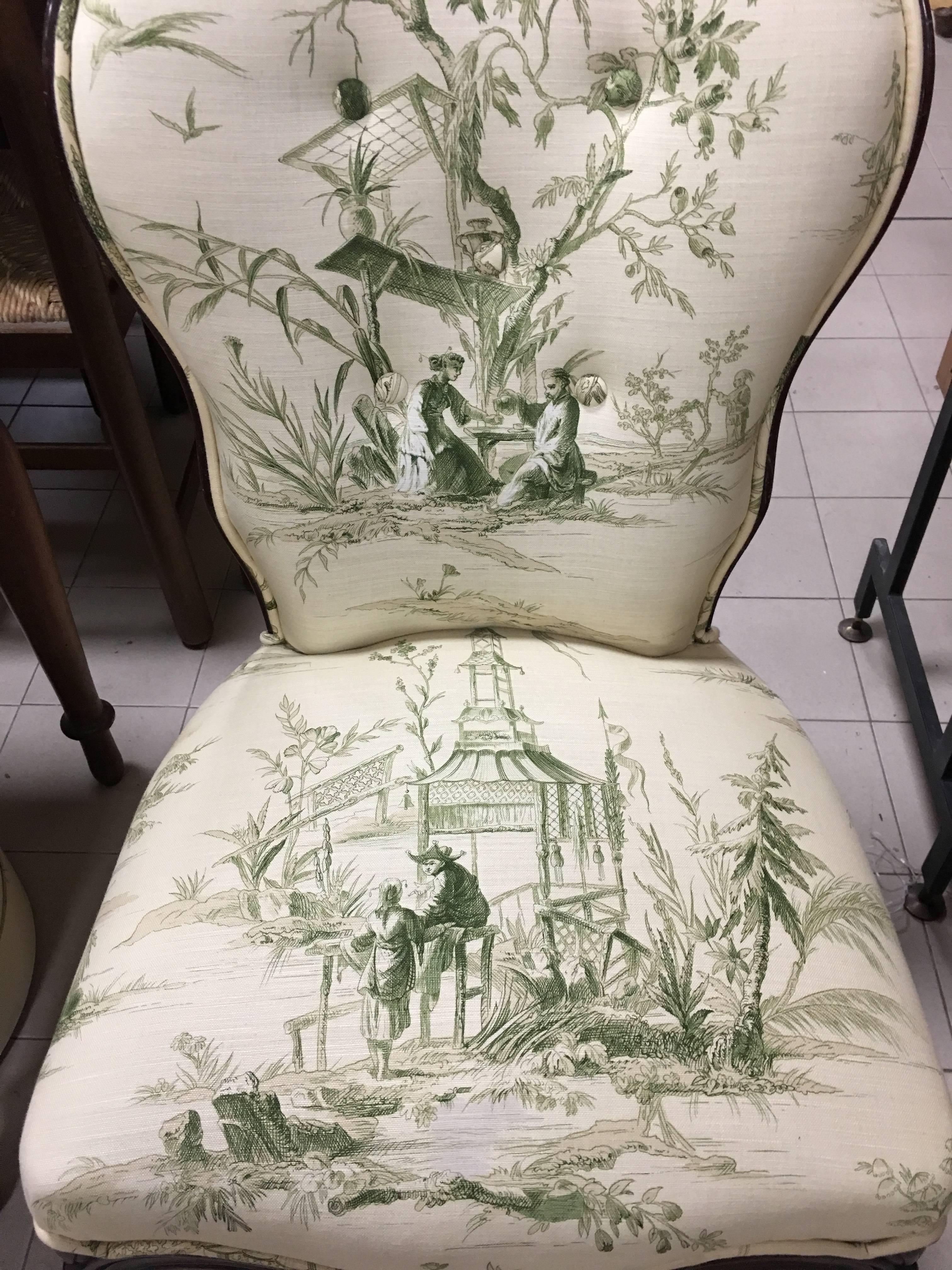 Two beautiful walnut side chairs restorated with a new lovely fabric.
