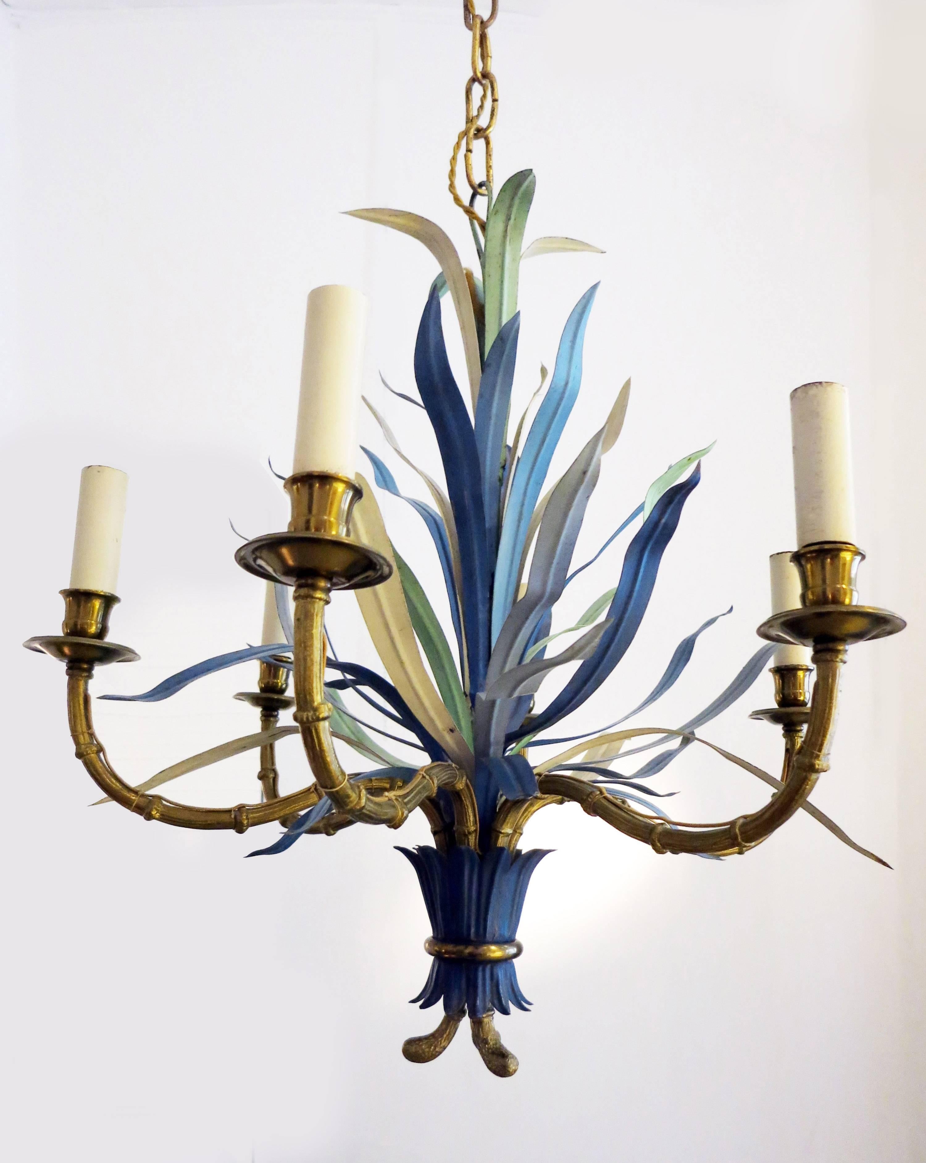 Rare colored blue and green Maison Baguès chandelier.
Gilt bronze as bamboo and painted steel leaves.